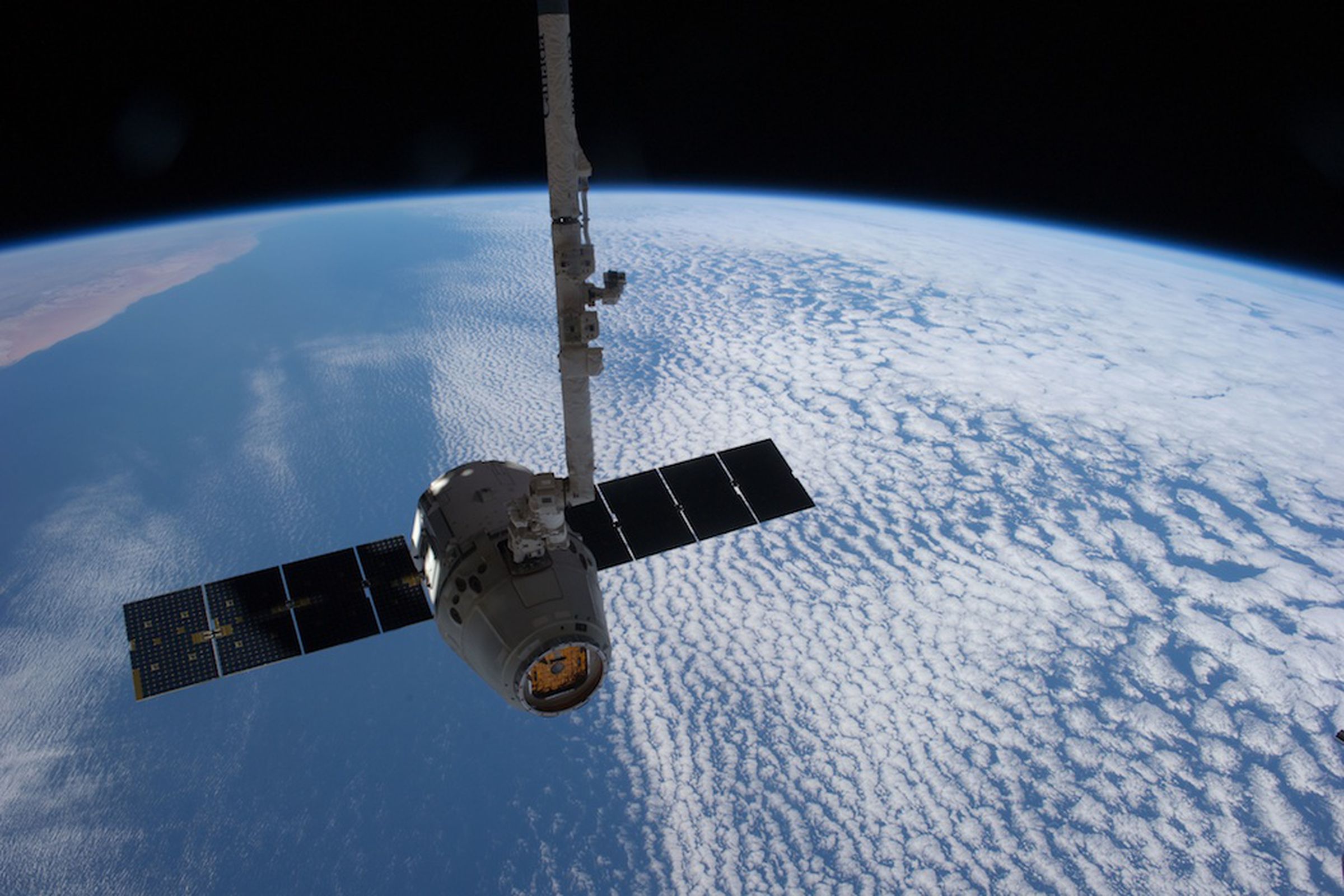 SpaceX Dragon docked to space station