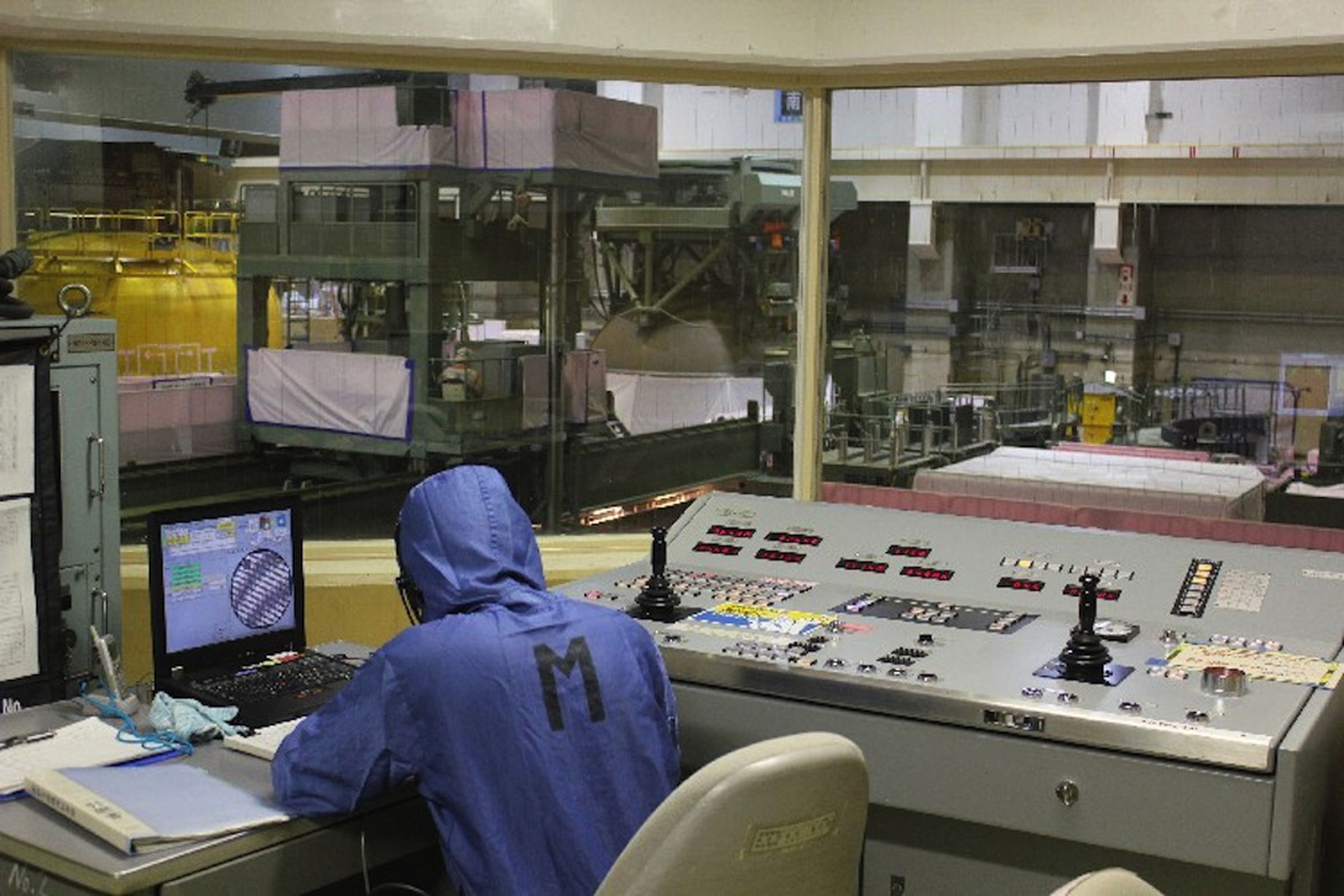 Fukushima reactor control room, suit (Credit: TEPCO)