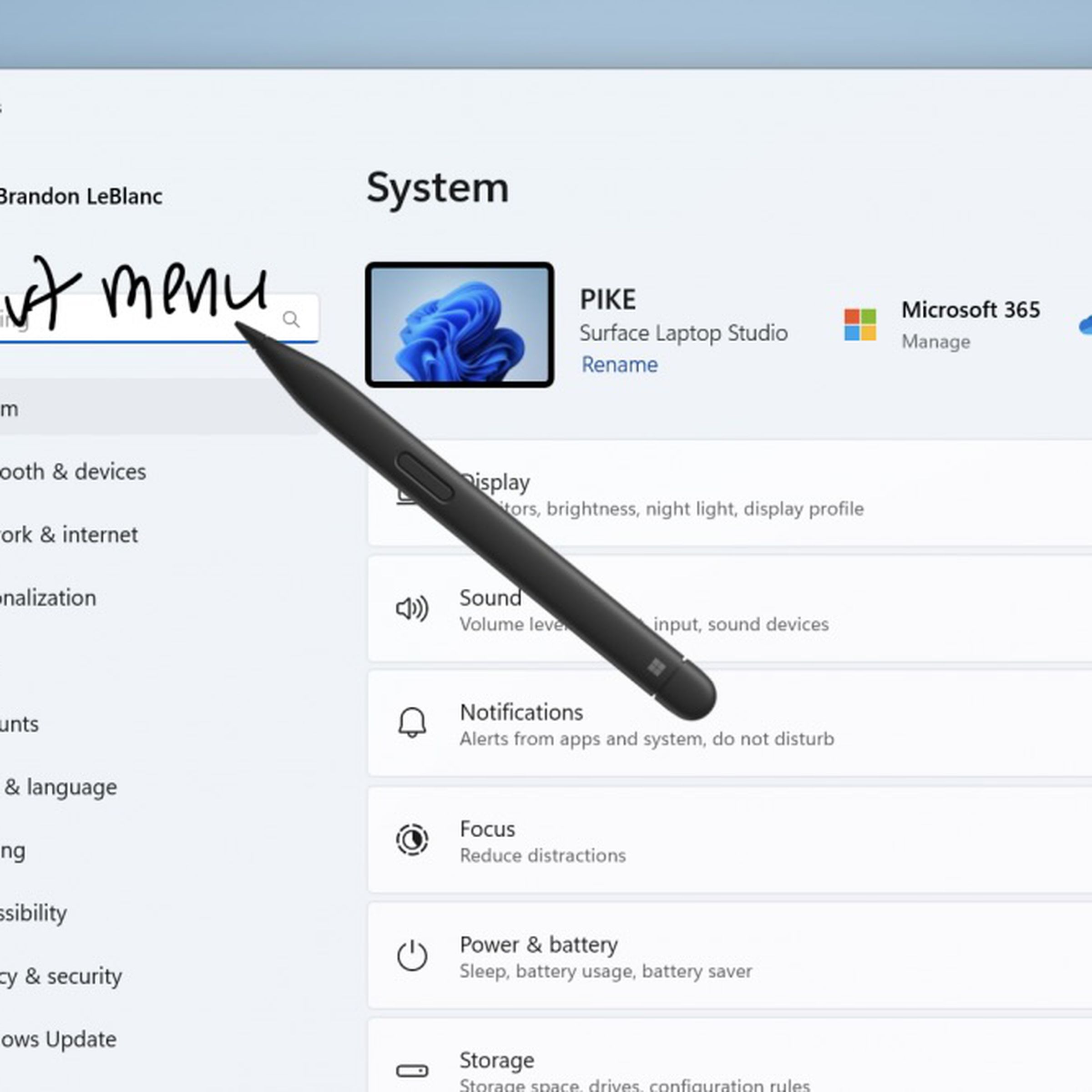Windows 11 settings screen with a floating stylus handwriting “start menu” in the find field.