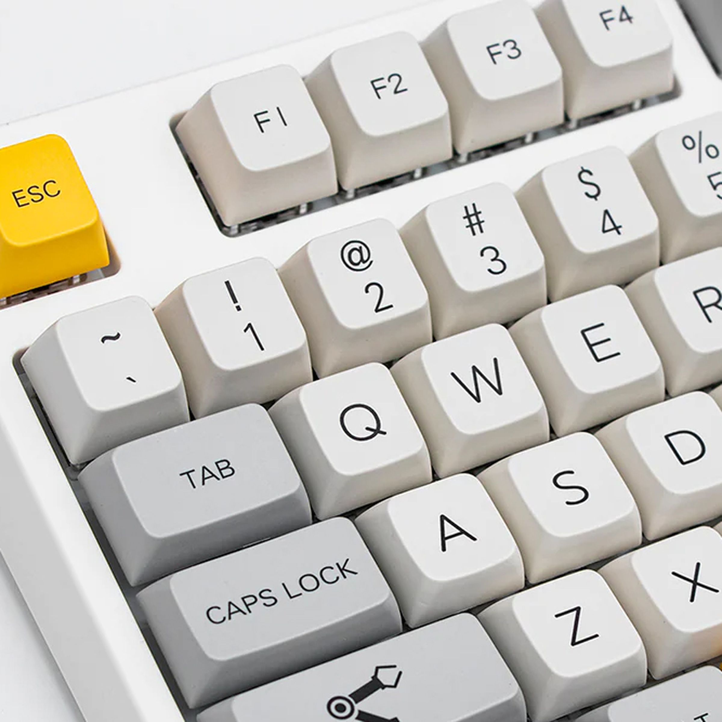 A close-up shot of Epomaker’s TH80 Pro keyboard with gray and yellow keycaps.
