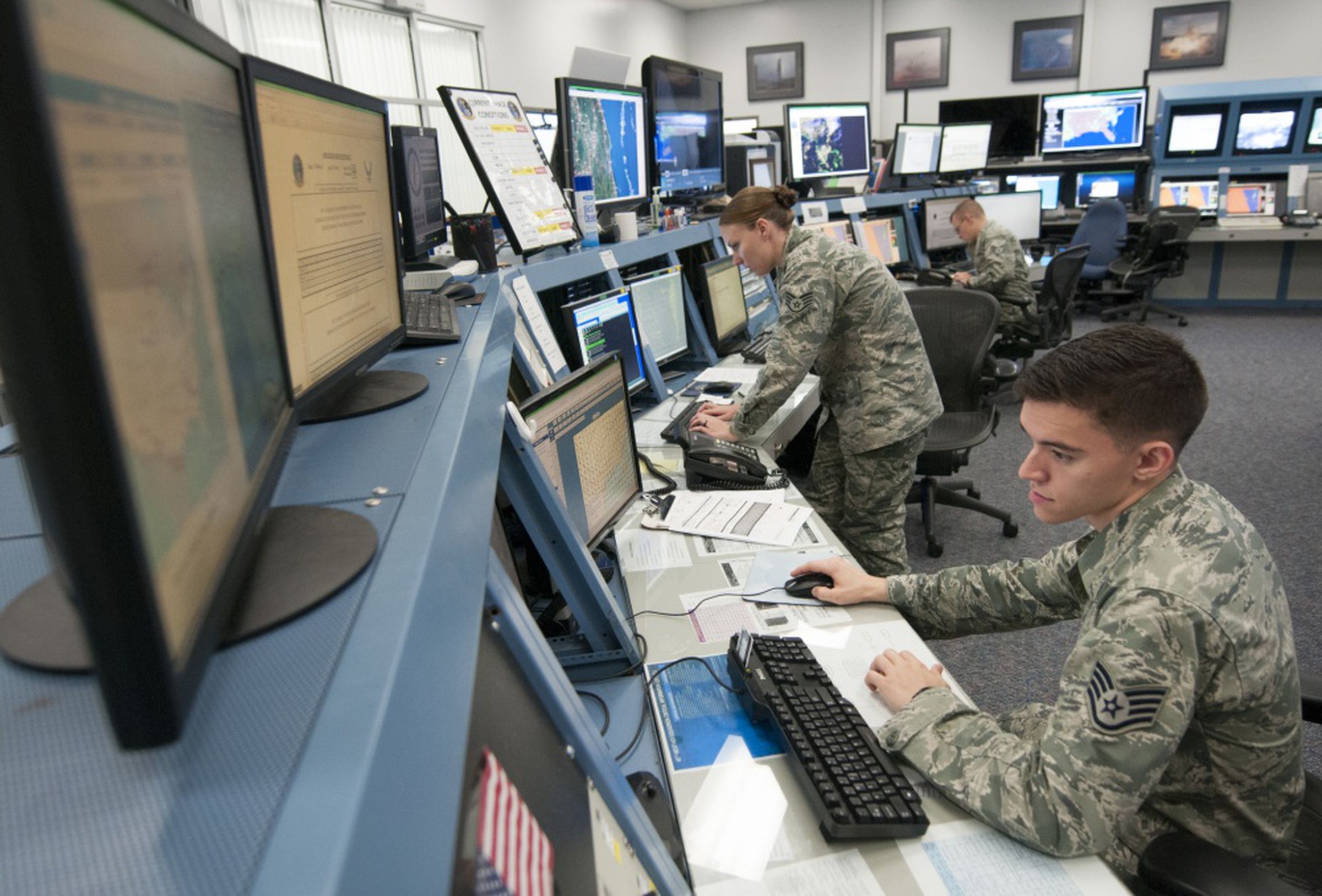 Members of the 45th Weather Squadron monitoring weather ahead of a launch in 2016.