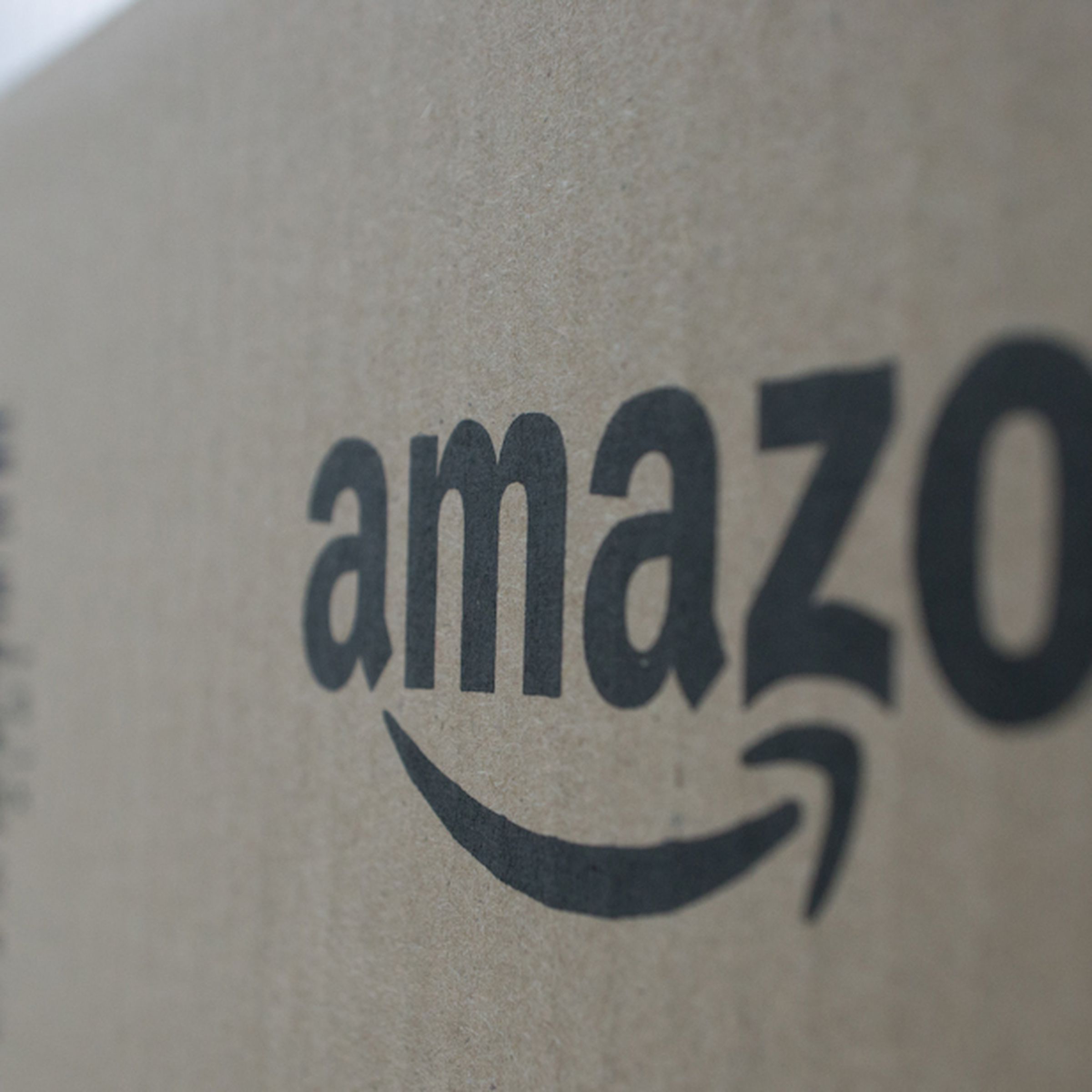 A photo showing a cardboard Amazon shipping box