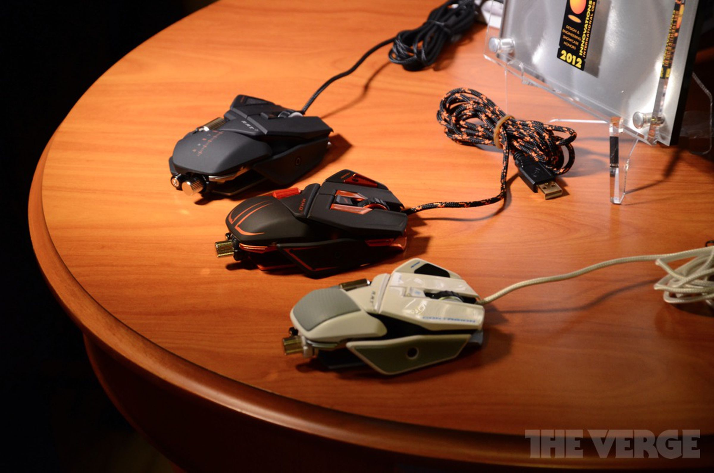 Mad Catz Cyborg Freq 5 headset, MMO7 mouse, and Street Fighter x Tekken Arcade FightStick VS hands-on pictures