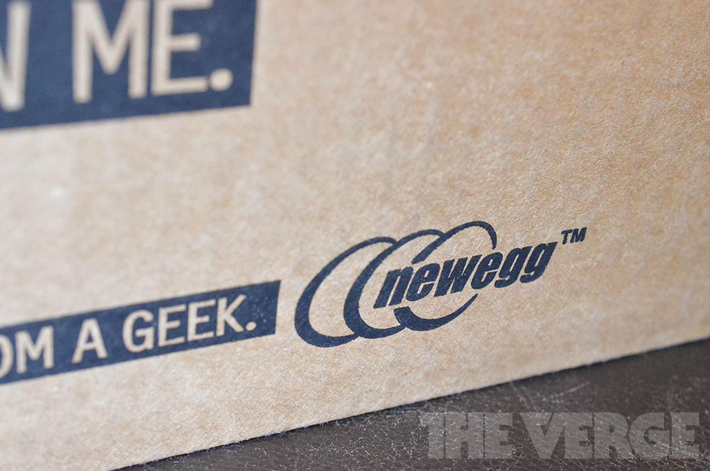 Image of the Newegg logo on a brown box