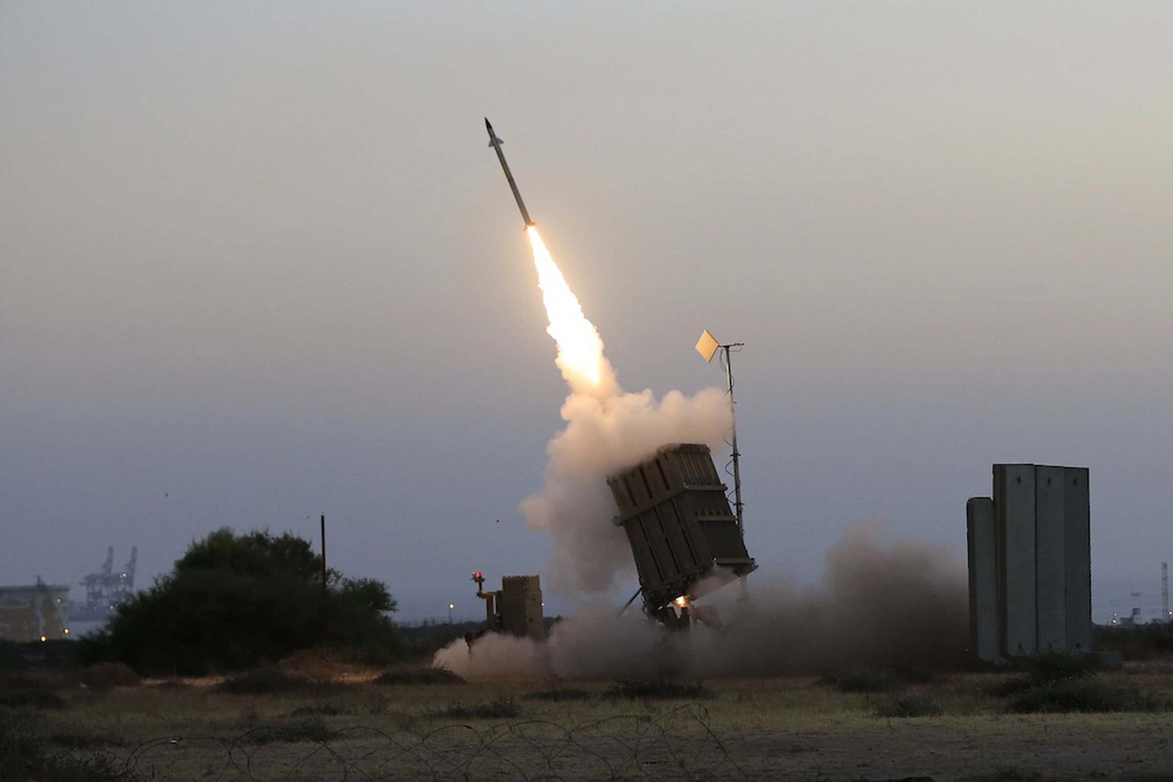 An Iron Dome missile defense system fires to intercept a rocket from Gaza