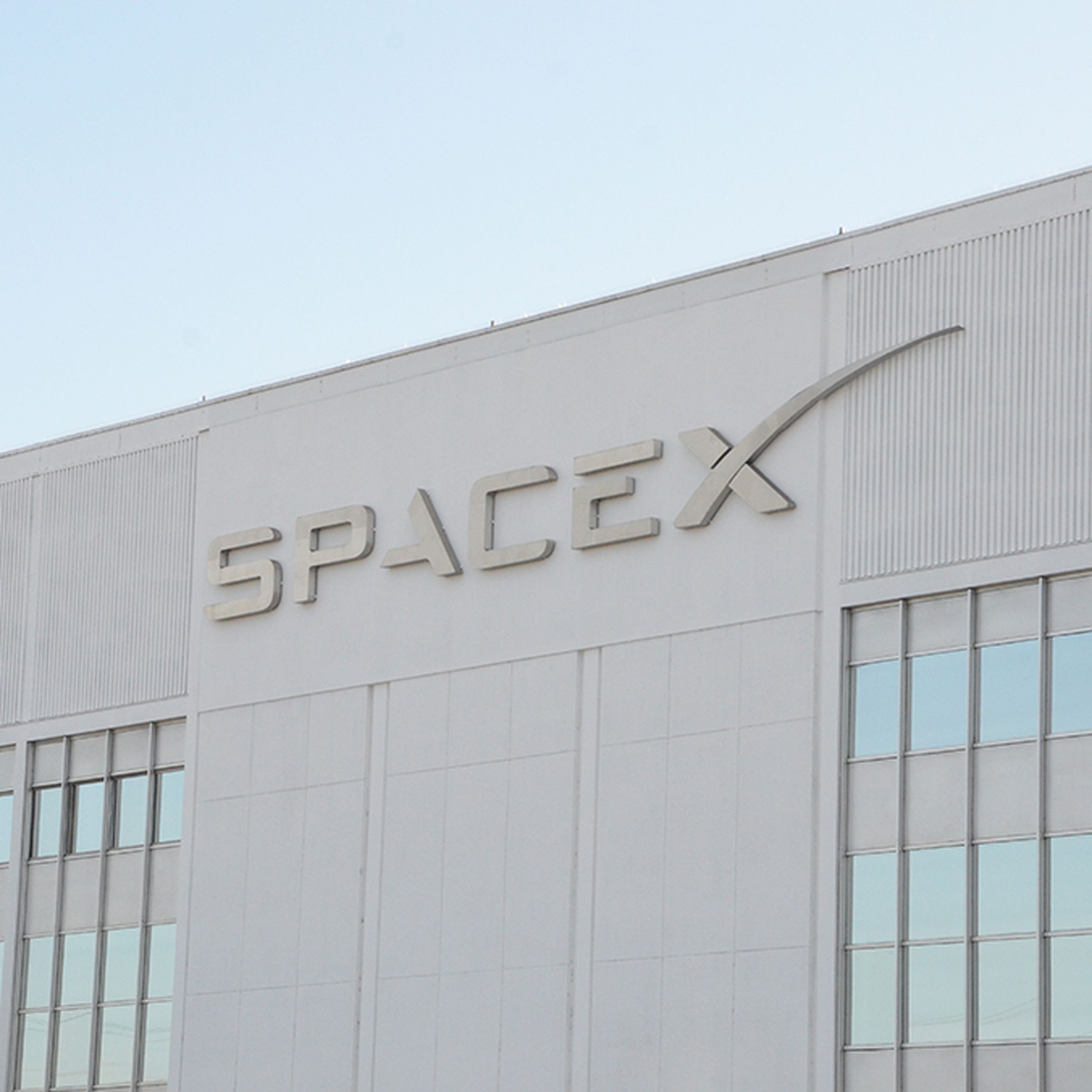 SpaceX logo on the side of a building