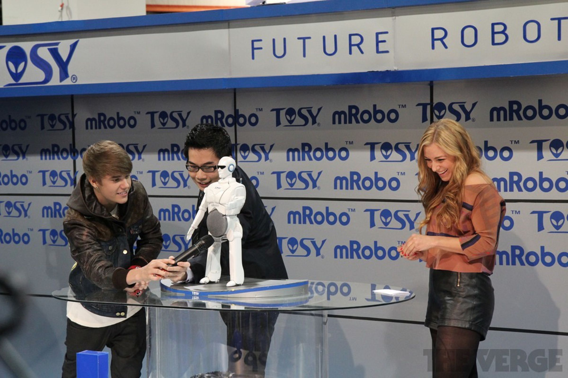 TOSY mRobo (Bieber bot) prototype with Justin Bieber press conference pictures