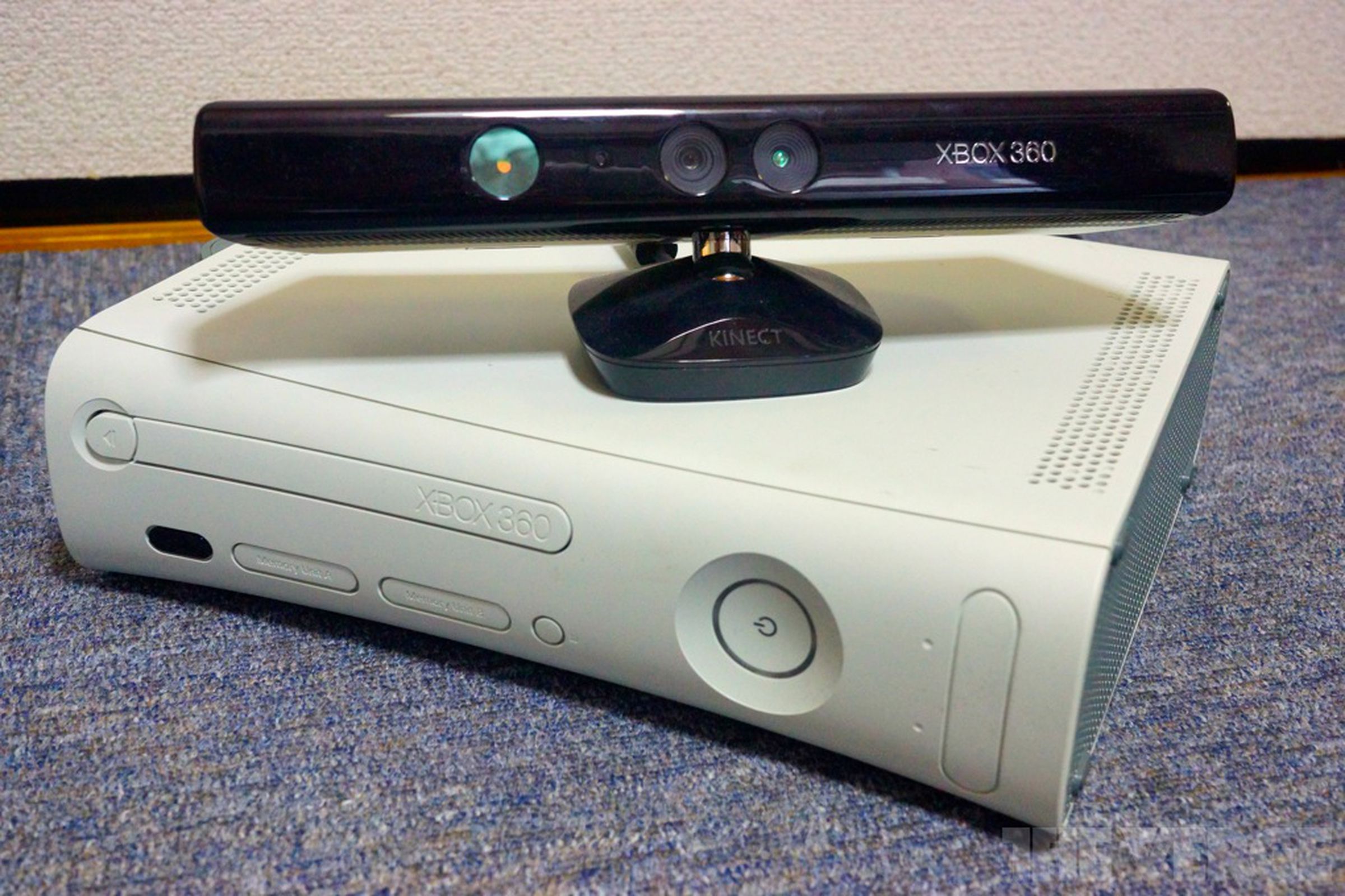 An Xbox 360 and a Kinect.