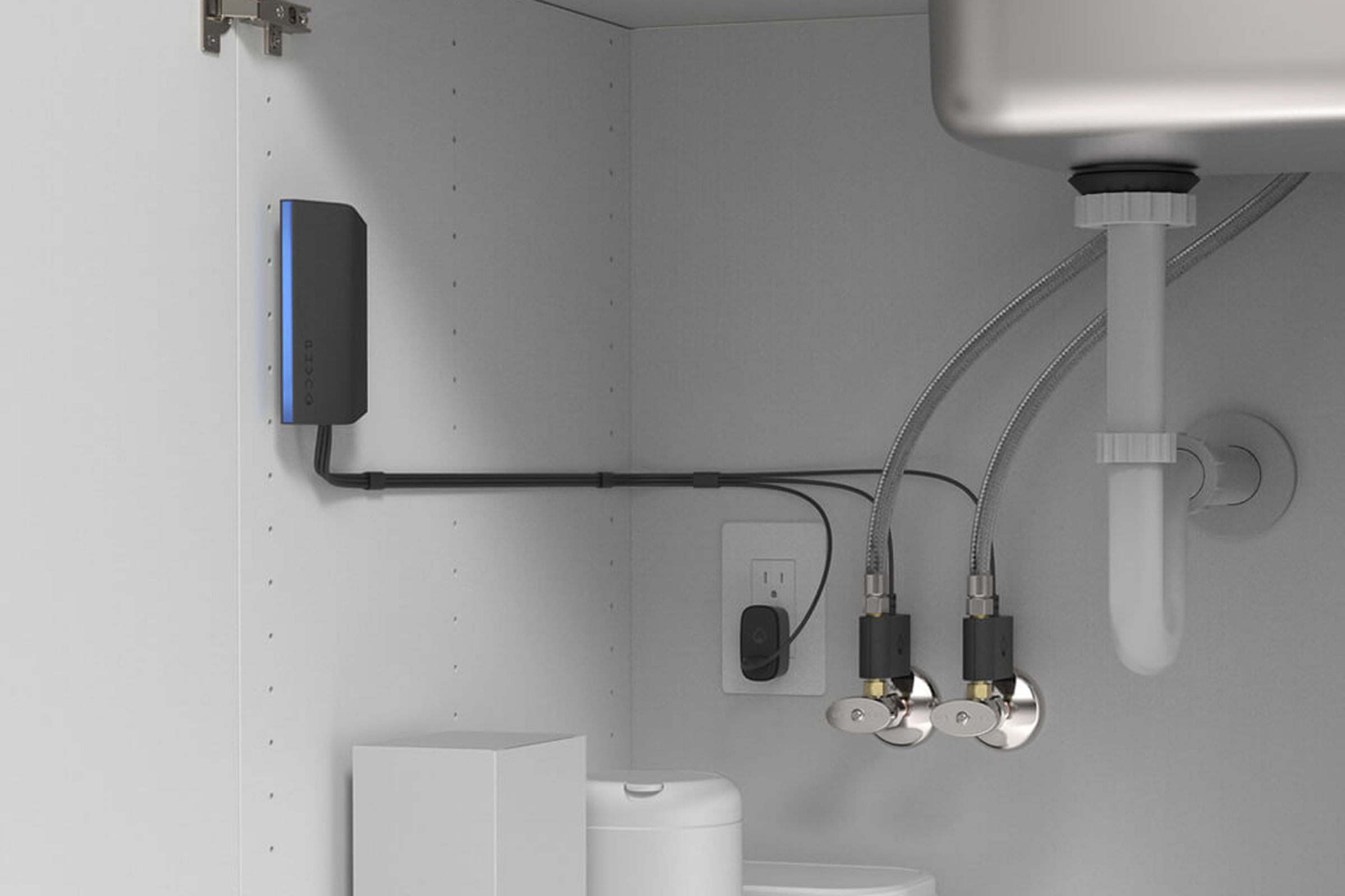 The Phyn Smart Water Assistant installed under a kitchen sink.