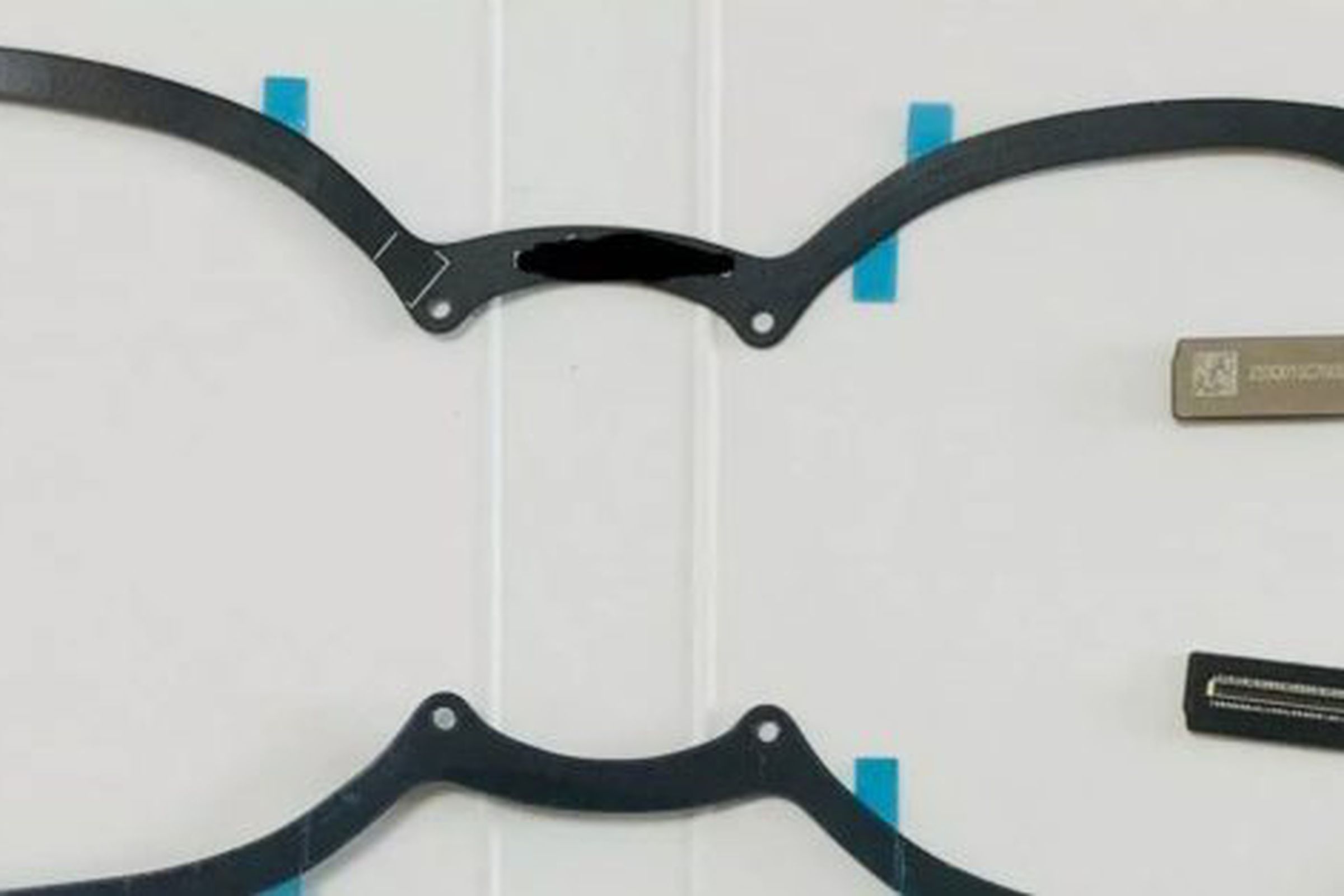 Photo of two ribbon cables that look like a pair of glasses.