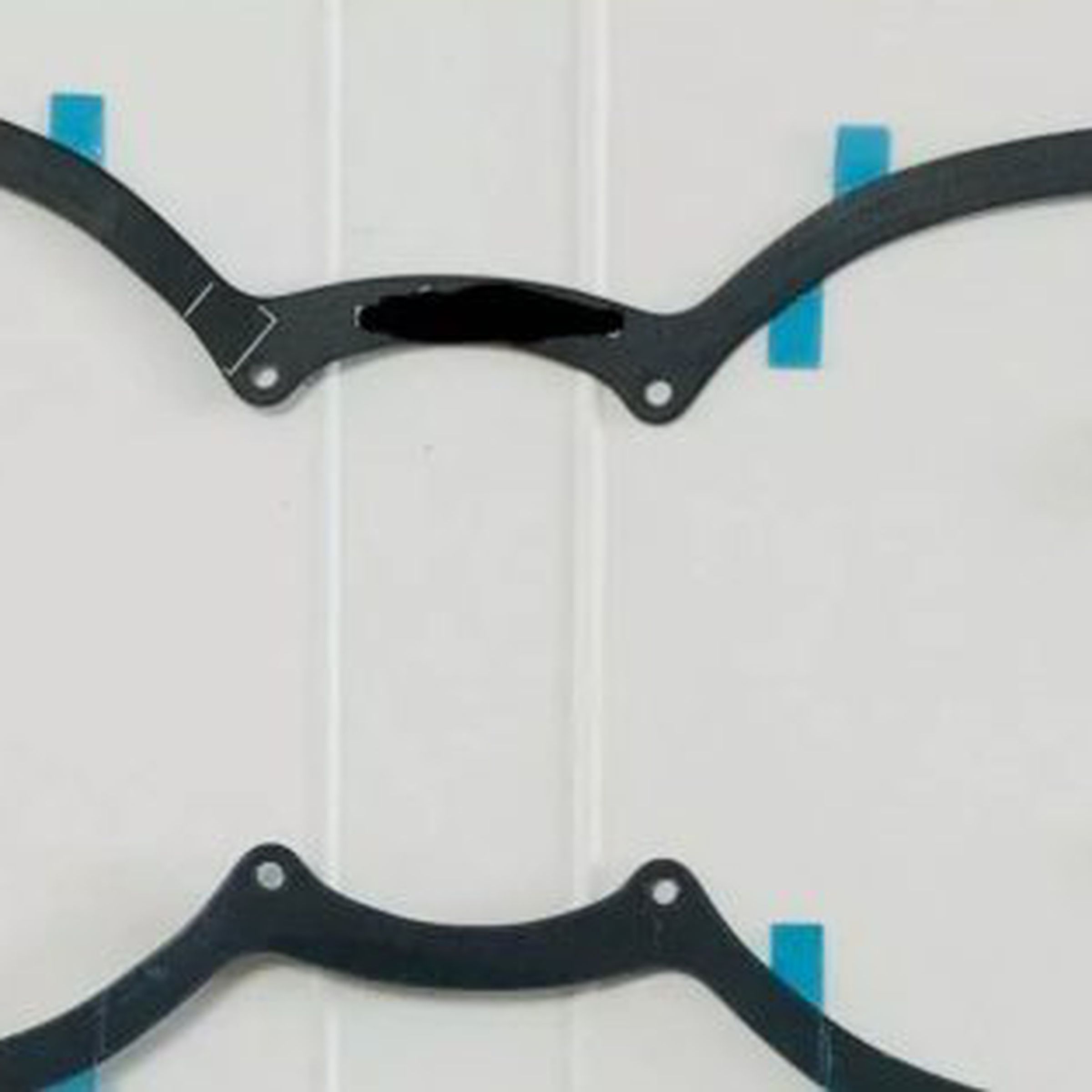Photo of two ribbon cables that look like a pair of glasses.