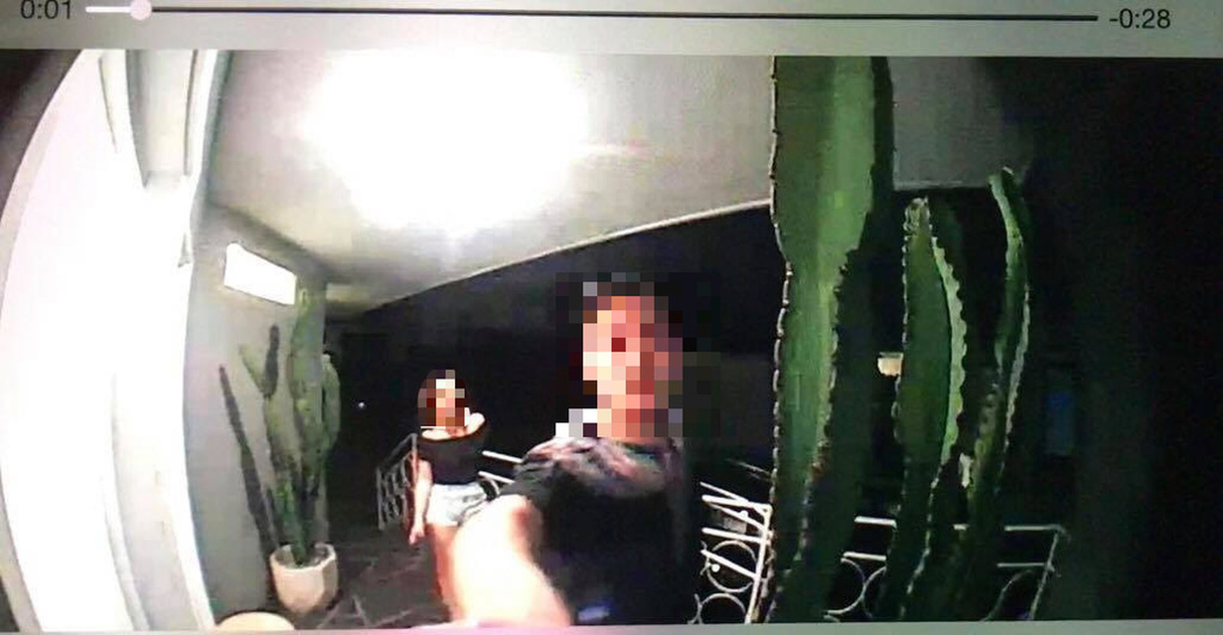 A still from a surveillance video shot by an Andy Mai victim who lost two Chanel bags. The video depicts the individuals who came to collect the merchandise.