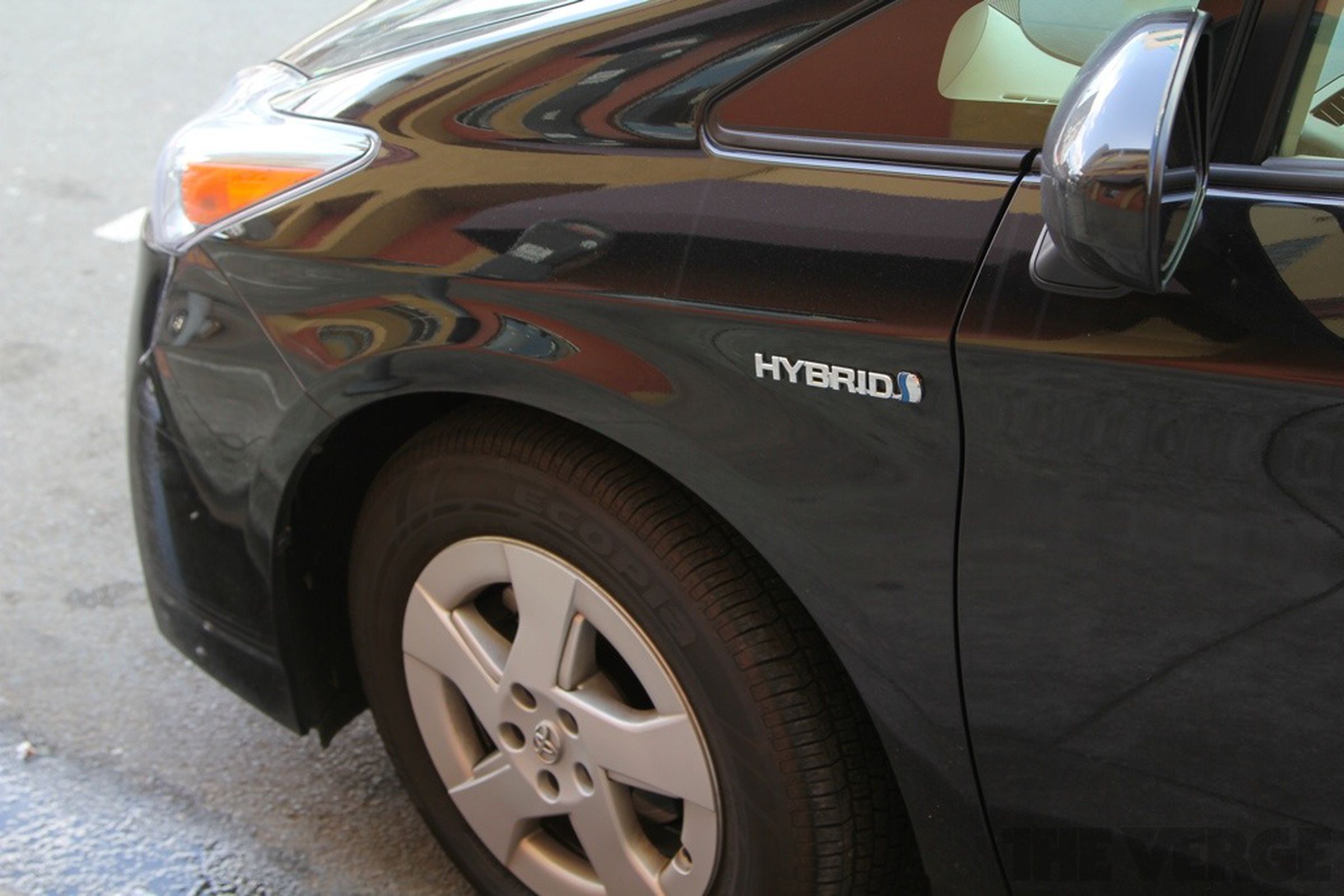 Toyota Prius hybrid badge hev stock 1024