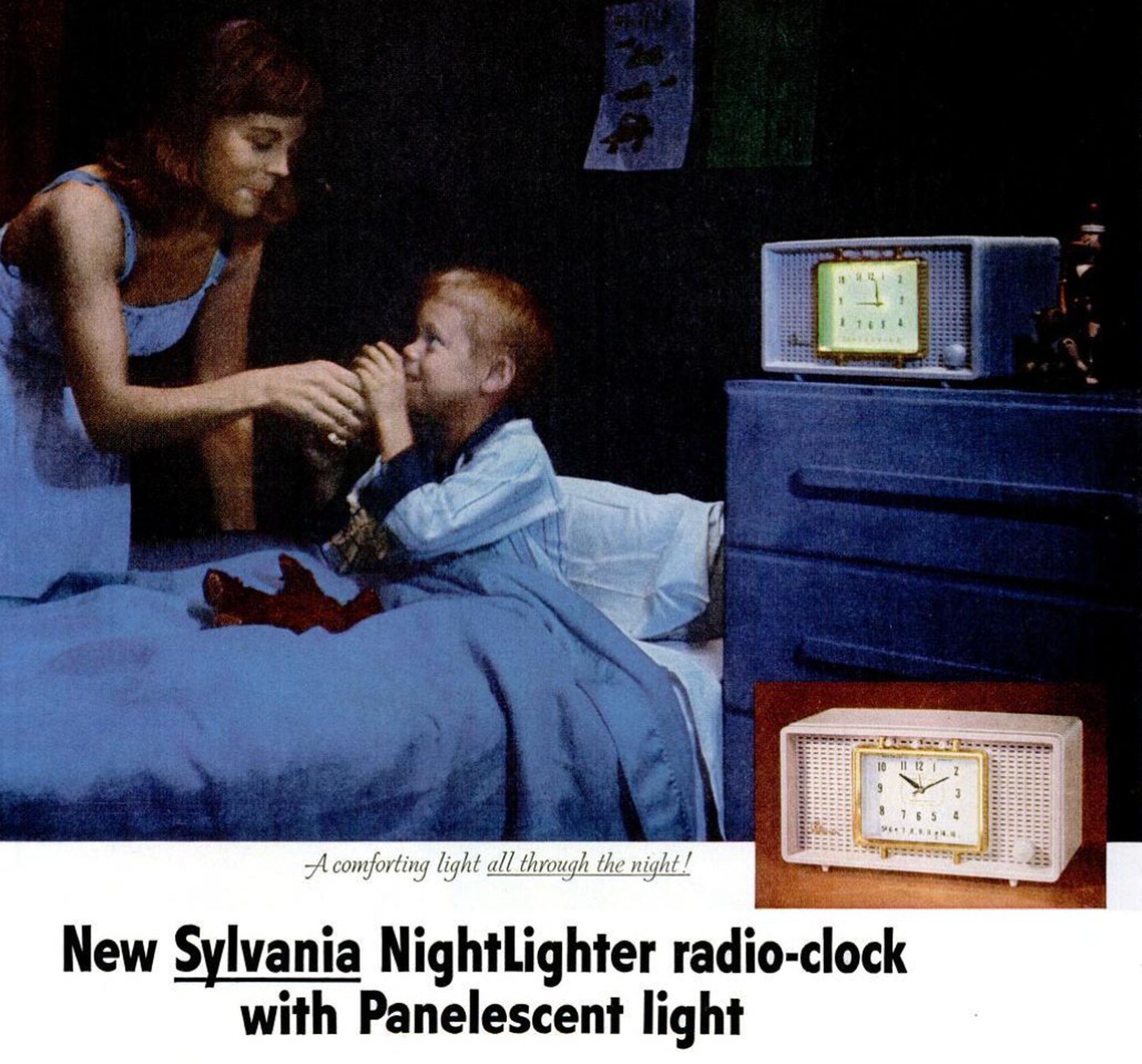 A woman gives her kid in bed a drink of water, next to a large vintage radio alarm clock with an analog face, lit up blue.
