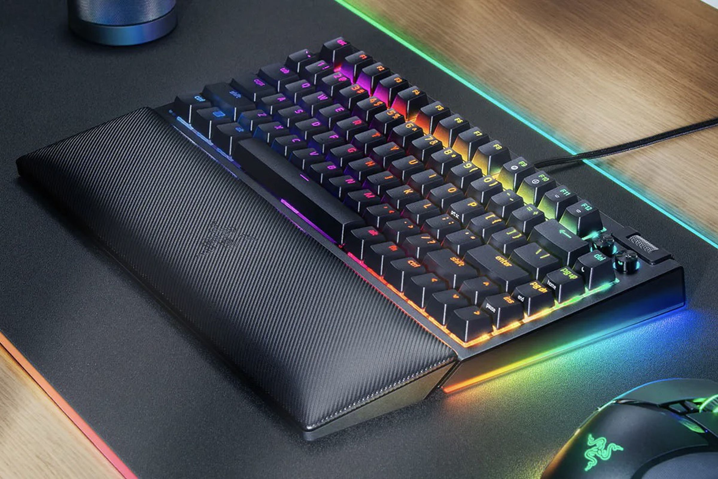 rgb-lit keyboard with mouse at side