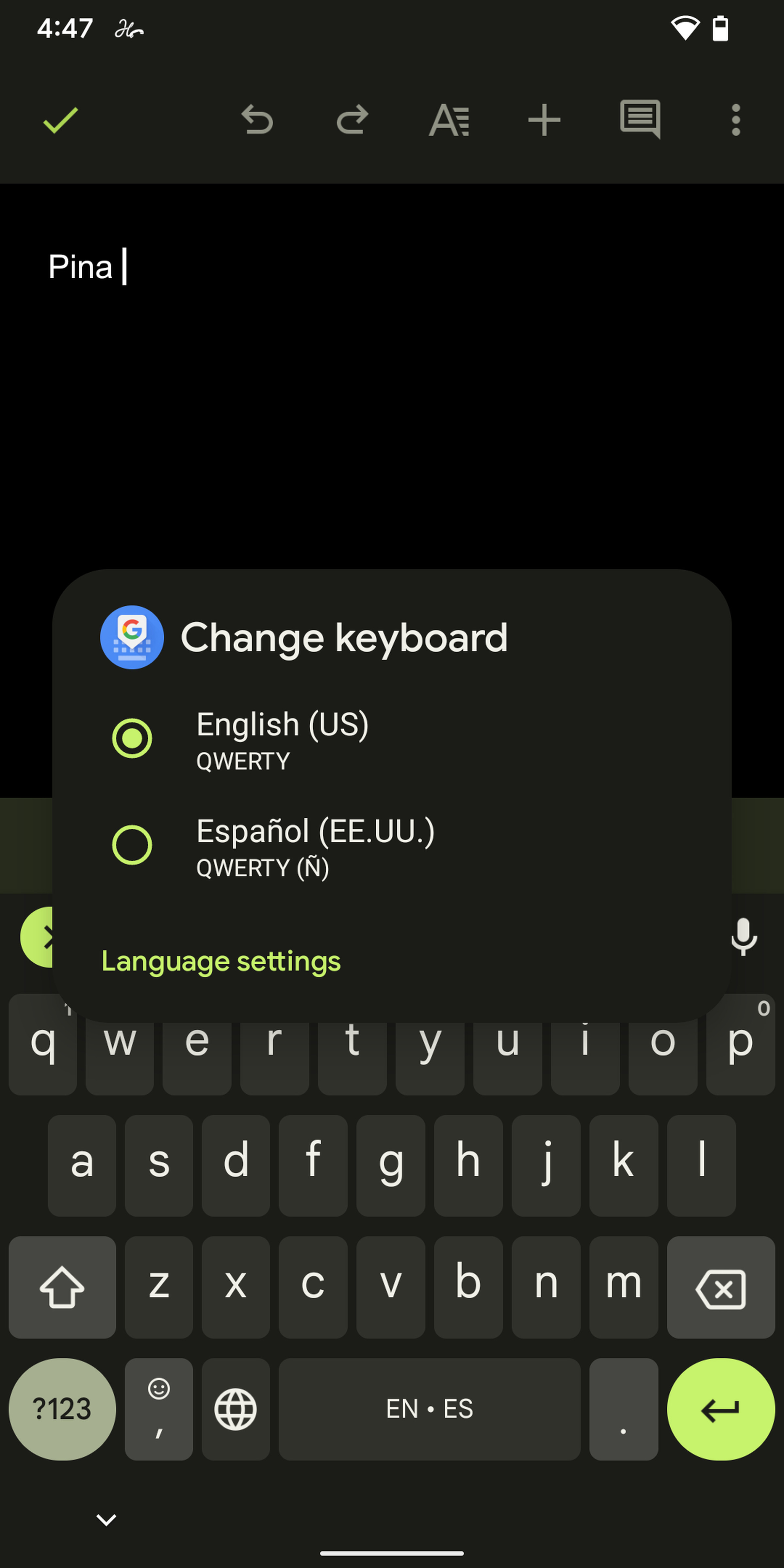 Long-press on the space bar to change language settings.