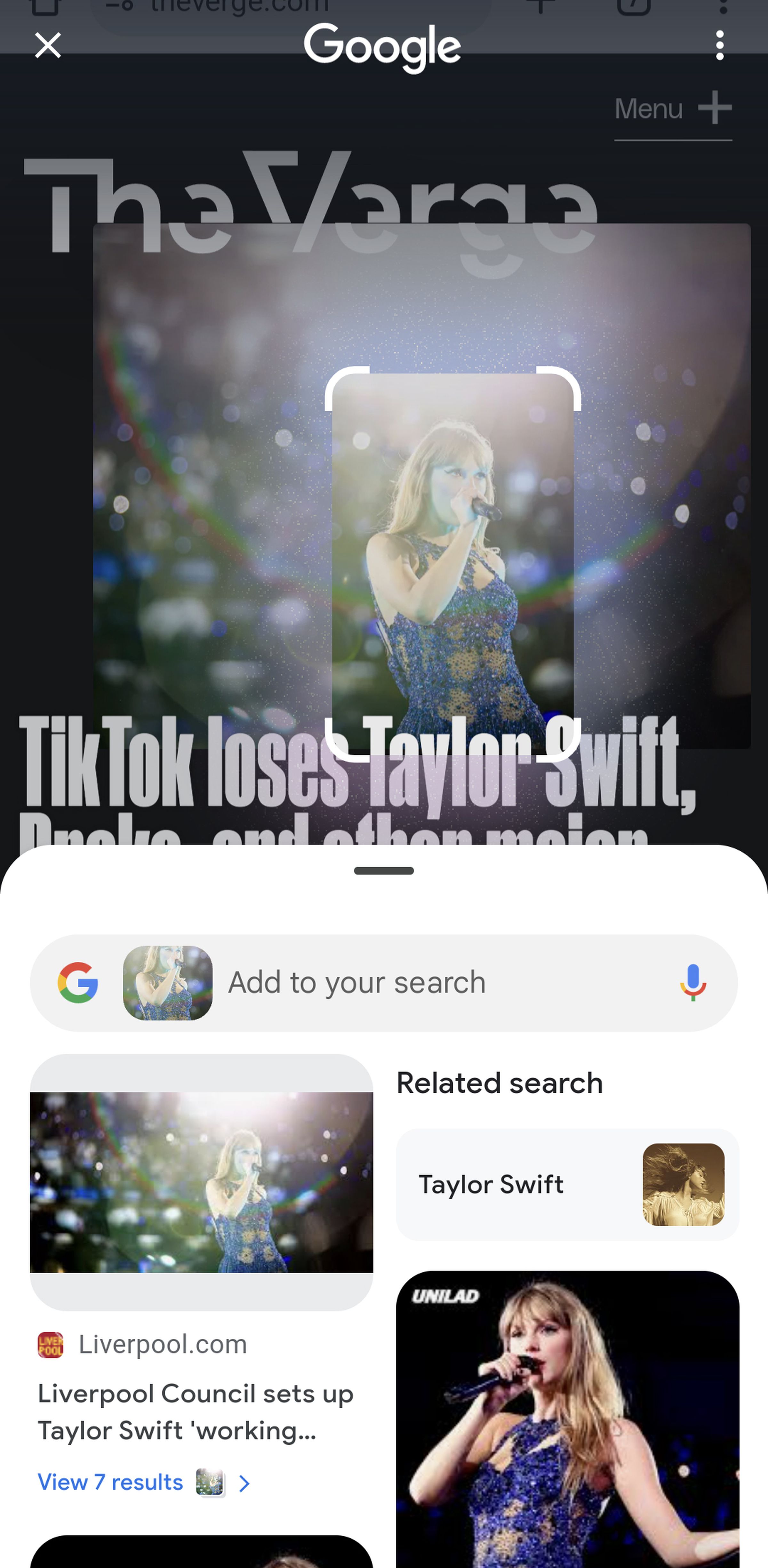 Mobile screen with image of Taylor Swift from The verge, with search results at the bottom.