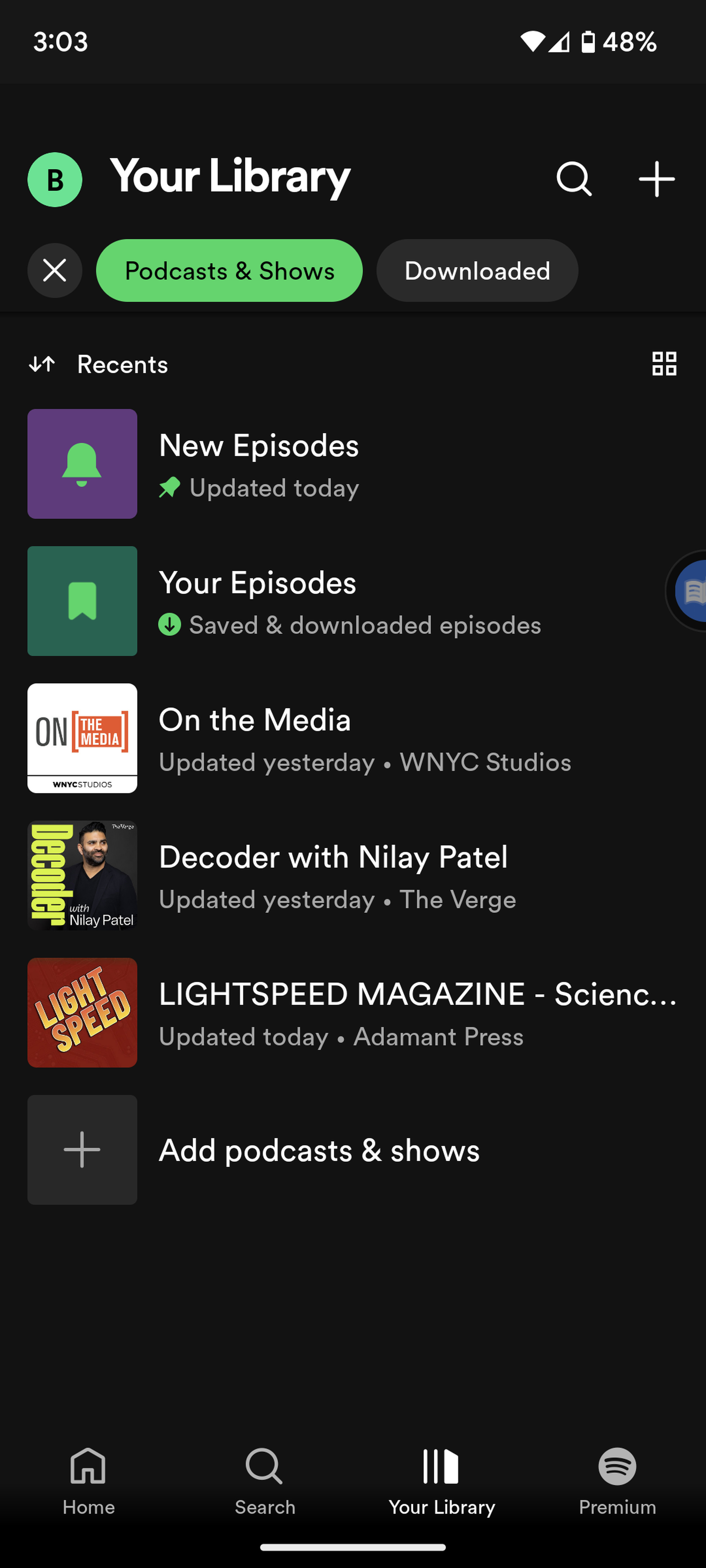 Page headed Your Library with highlighted button Podcasts &amp; Shows, and a listing of podcasts beneath.