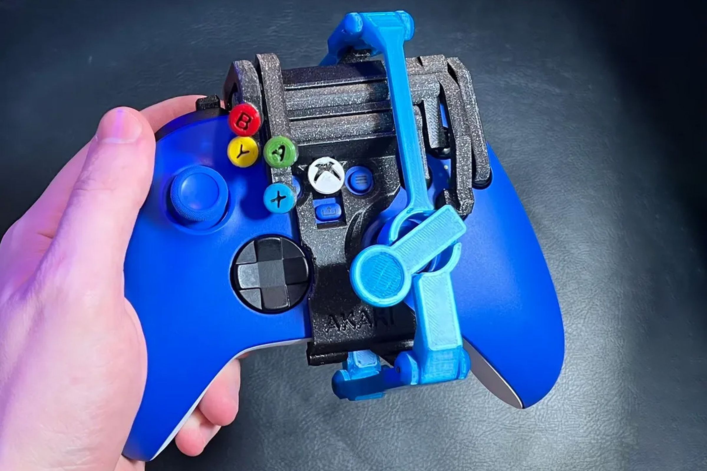 A controller with the one-handed mod installed.