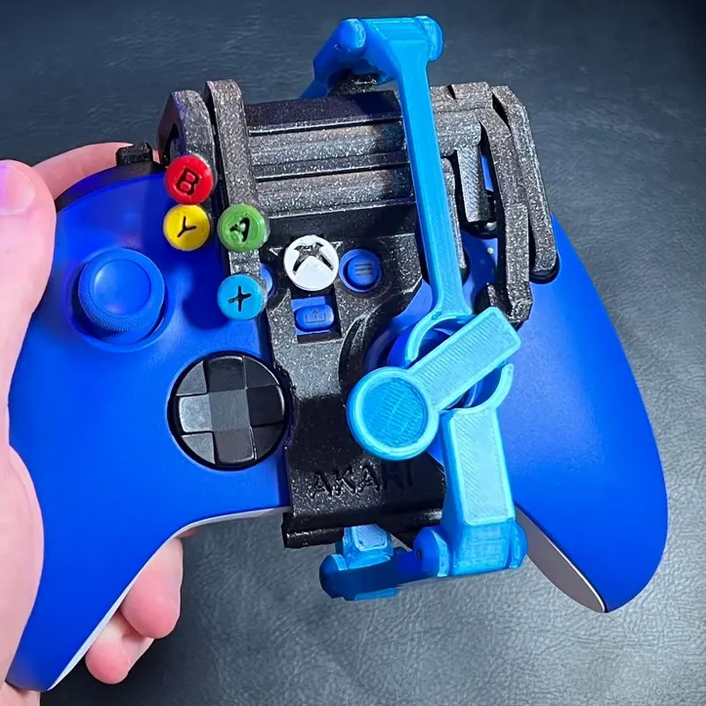 A controller with the one-handed mod installed.