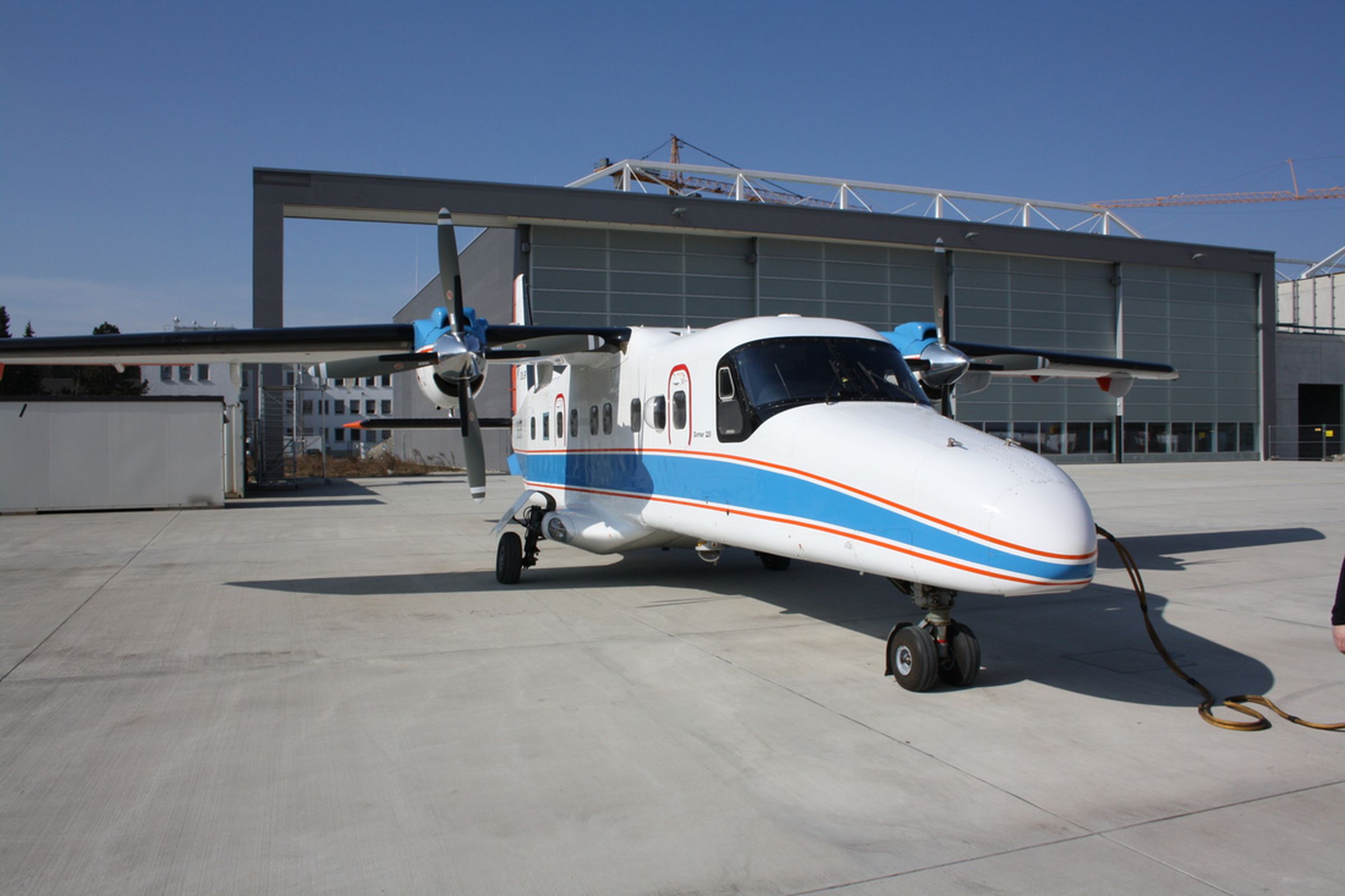 Laser-equipped propeller plane for quantum key distribution