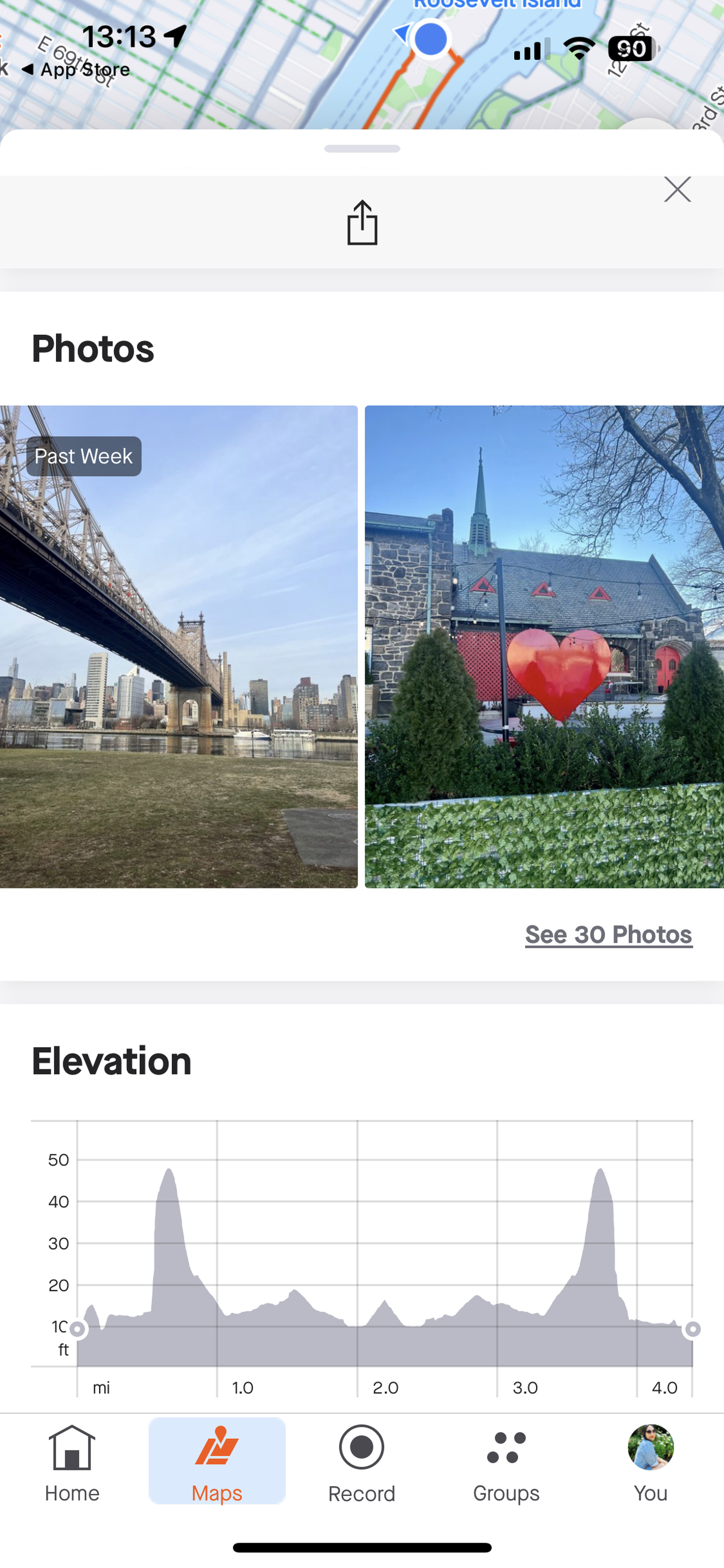 Screenshot of recommended routes photos showing a building with a big metal heart in front of it.