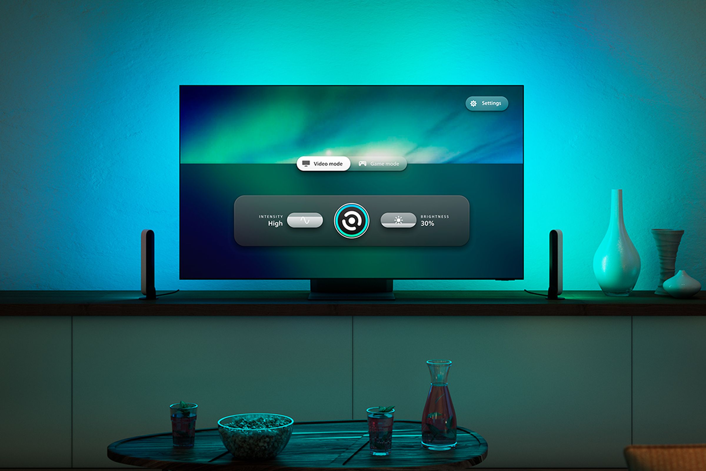 A Philips Hue app running on a Samsung TV and illuminating the rear of the TV with blue light
