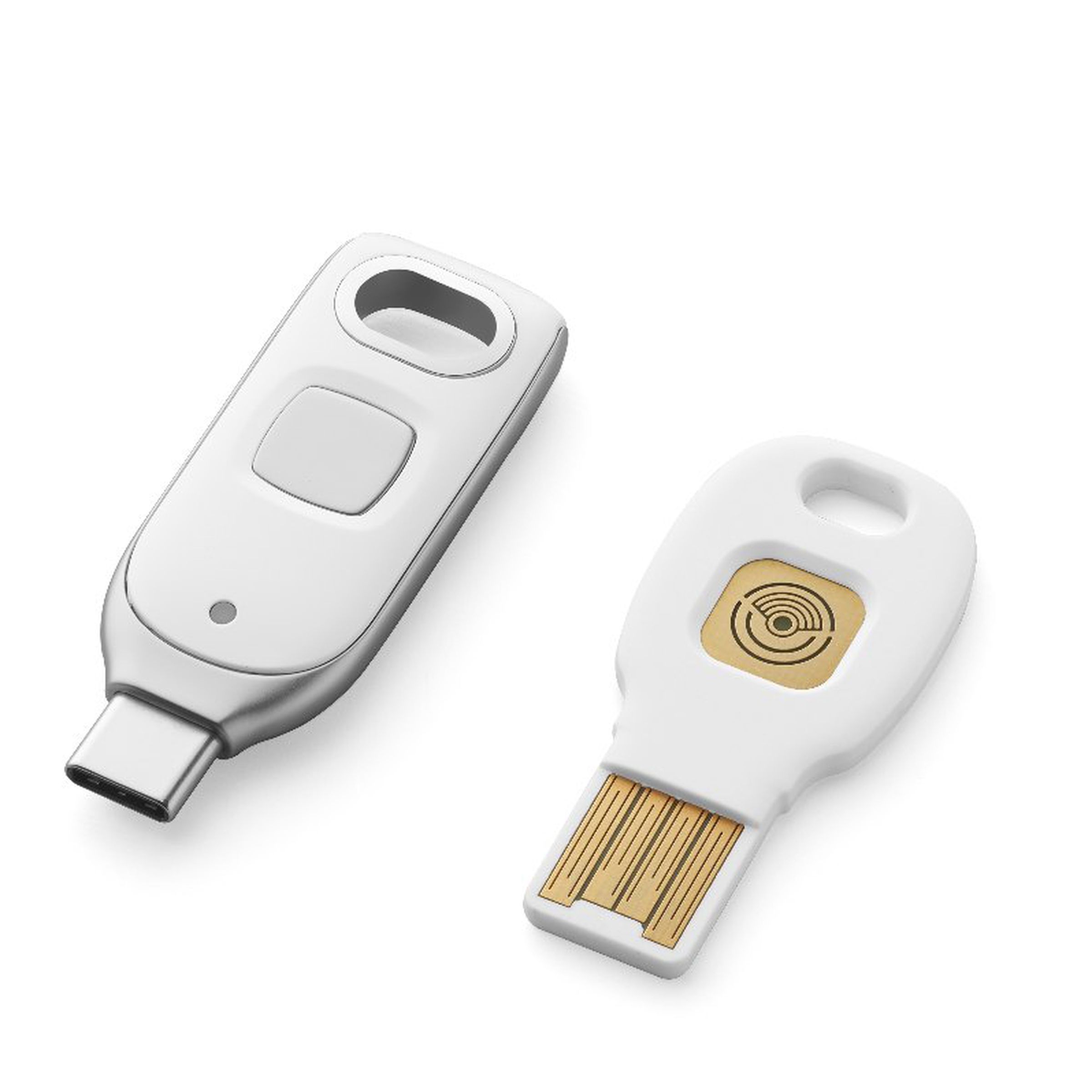 Two cryptographic security keys, one USB-C and one USB-A on a white background.