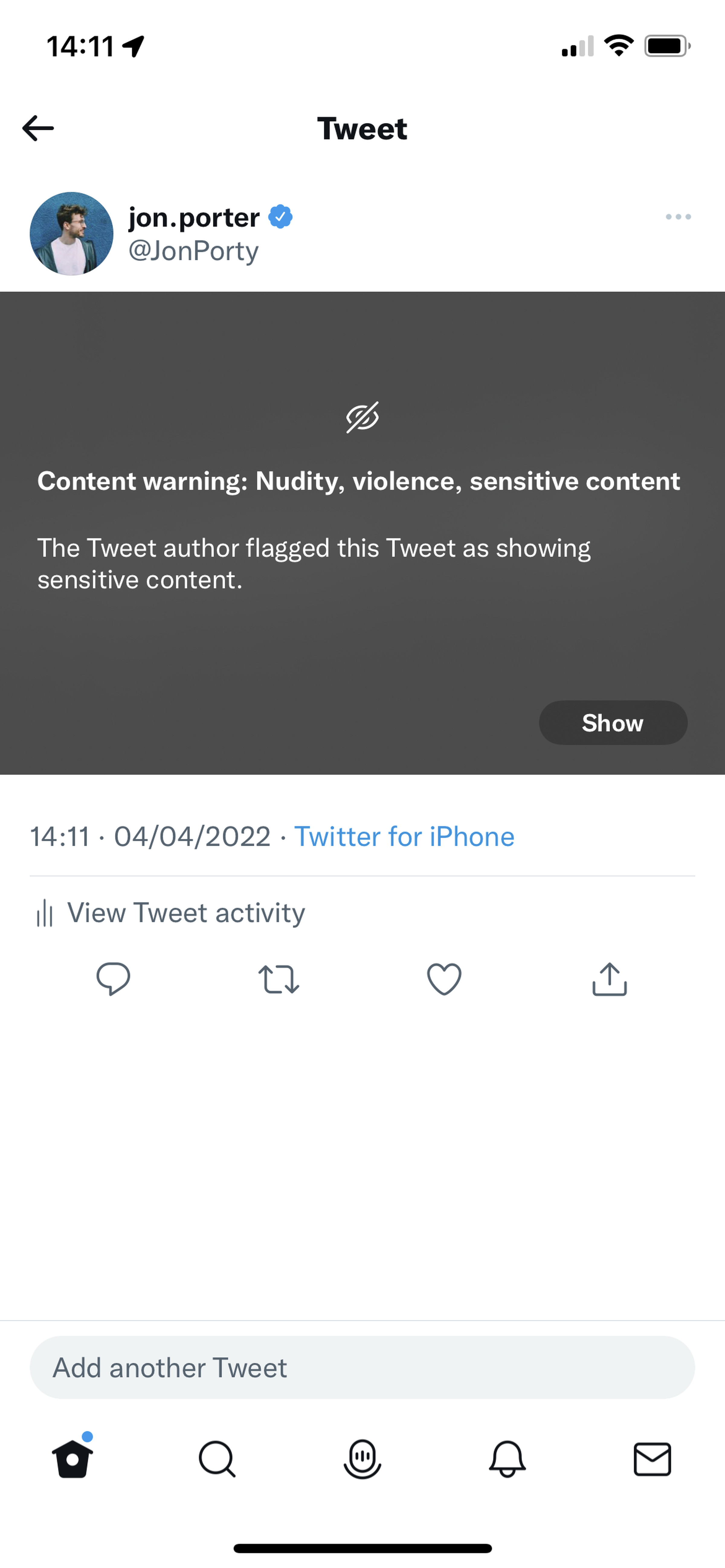 <em>Here’s how the content warning appears on Twitter.</em>