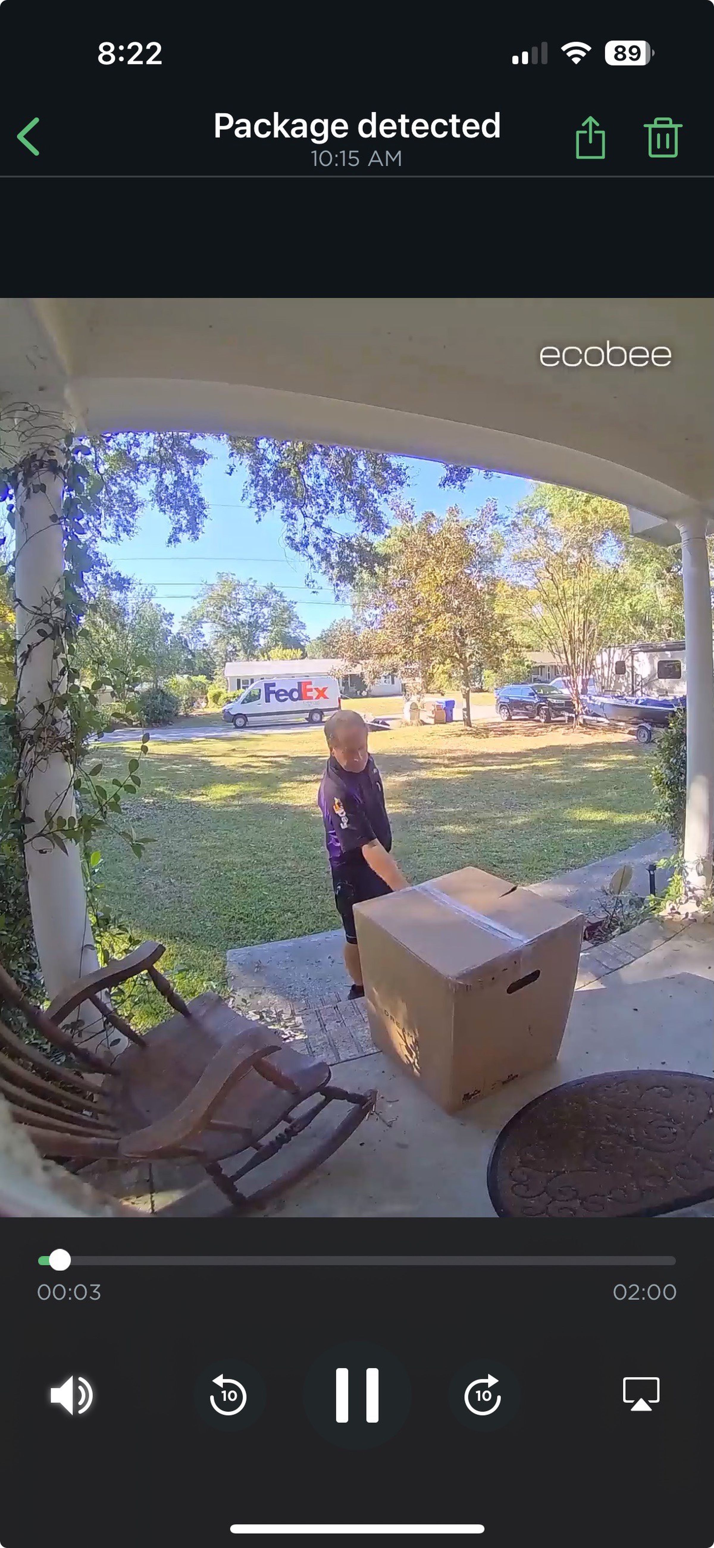 <em>This image shows a FedEx delivery person collecting a package from my font door. The doorbell only alerted me to a package being present, not a person. So I missed him taking the package away.</em>