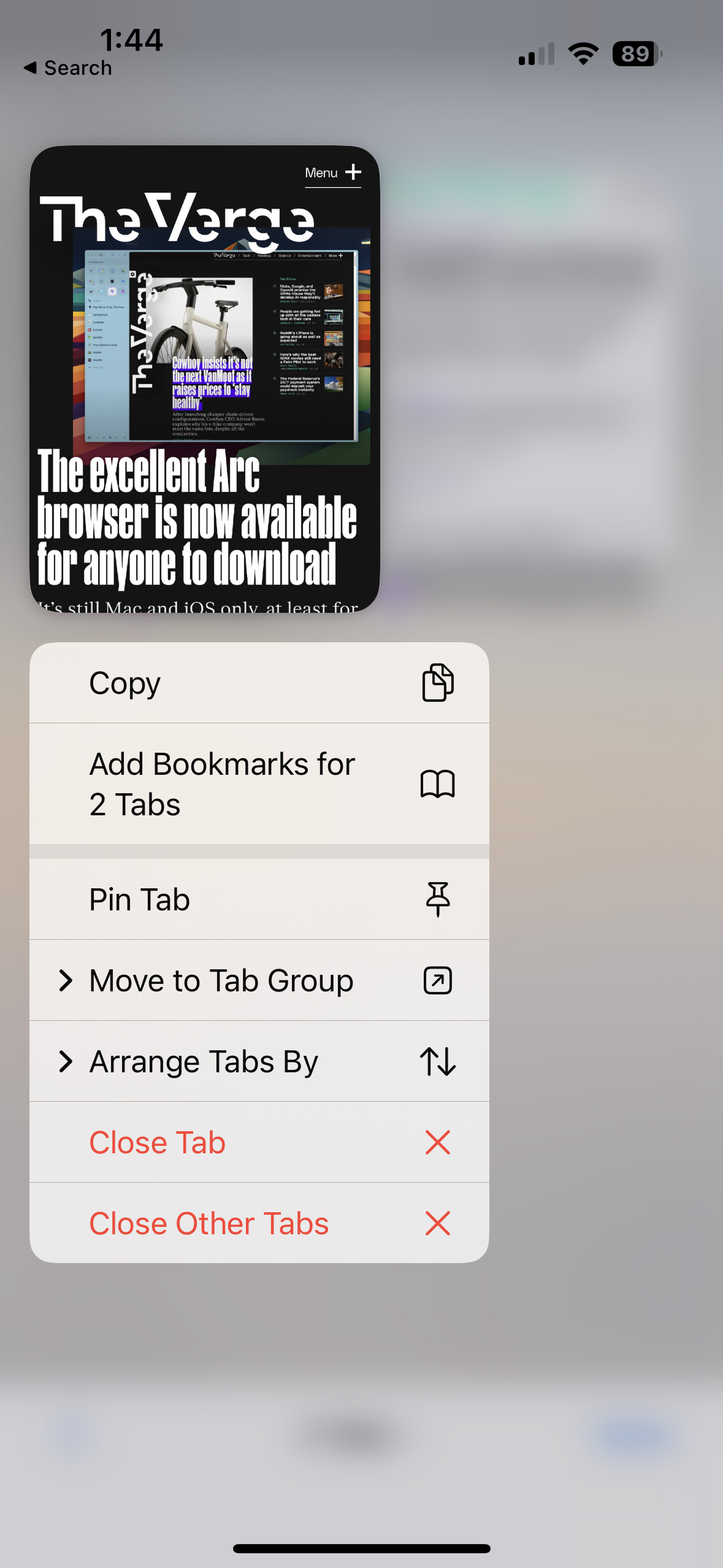 A screenshot of Safari on iOS with a tab long-pressed and Move to Tab Group selected.