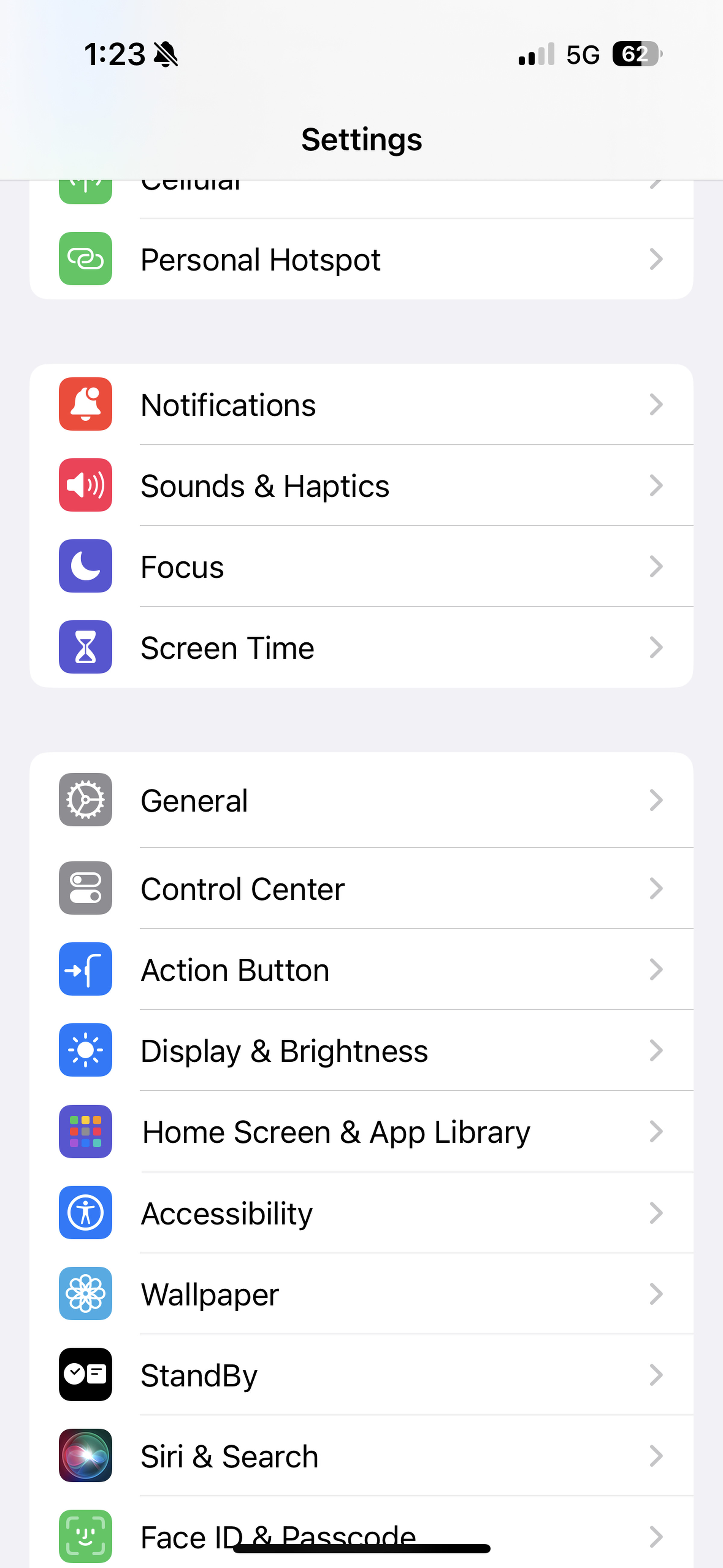Screenshot showing iOS Settings menu with new Action Button page.