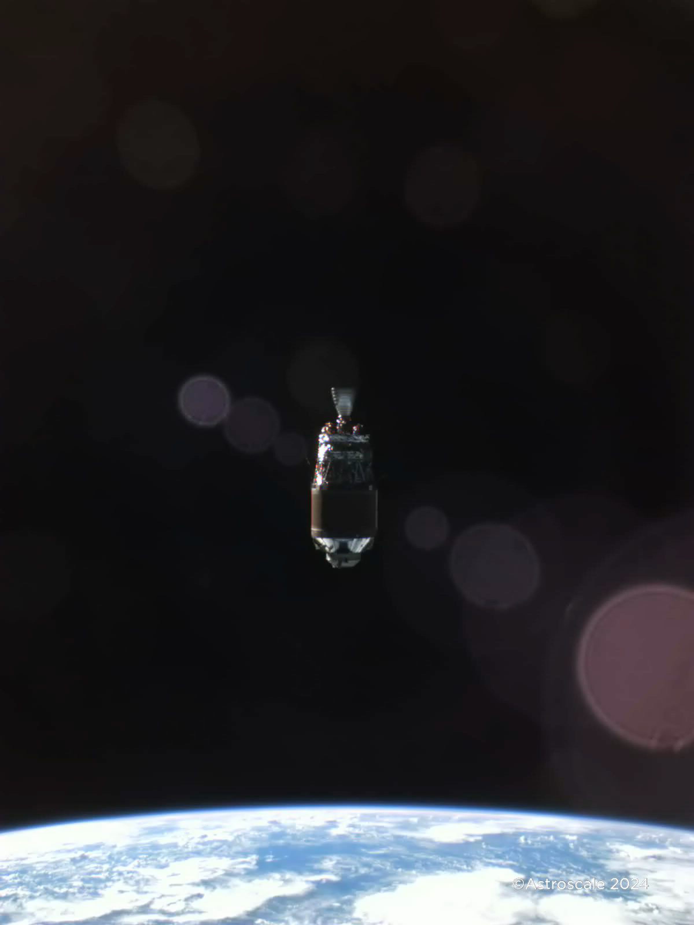 A photograph of a H-2A upper stage discarded in Earth’s orbit, taken by Astroscale’s ADRAS-J spacecraft.