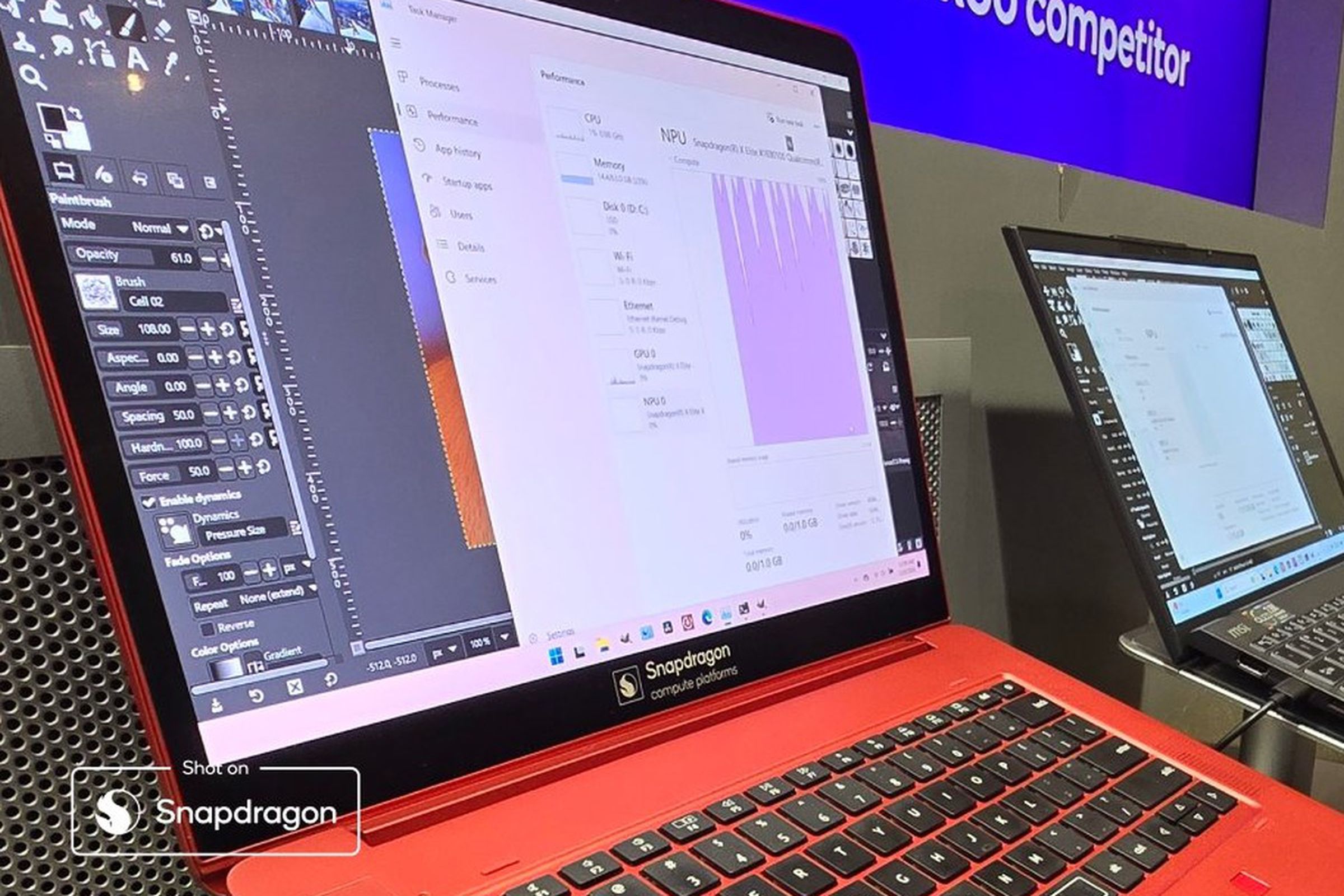 The red Snapdragon X Elite reference design laptop Qualcomm used to show off the games.