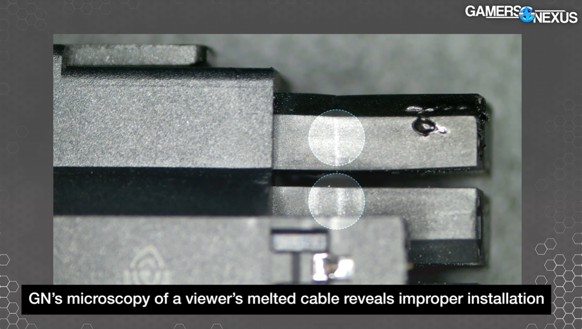 Screenshot of a video showing a connector with clean lines on its plastic pins.