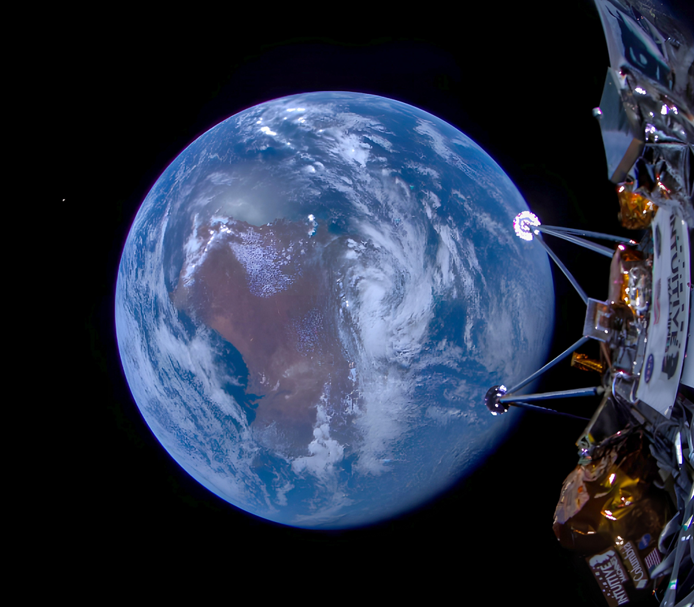 A picture of the Earth, with the legs of the Odysseus craft in view in the right side of the frame.
