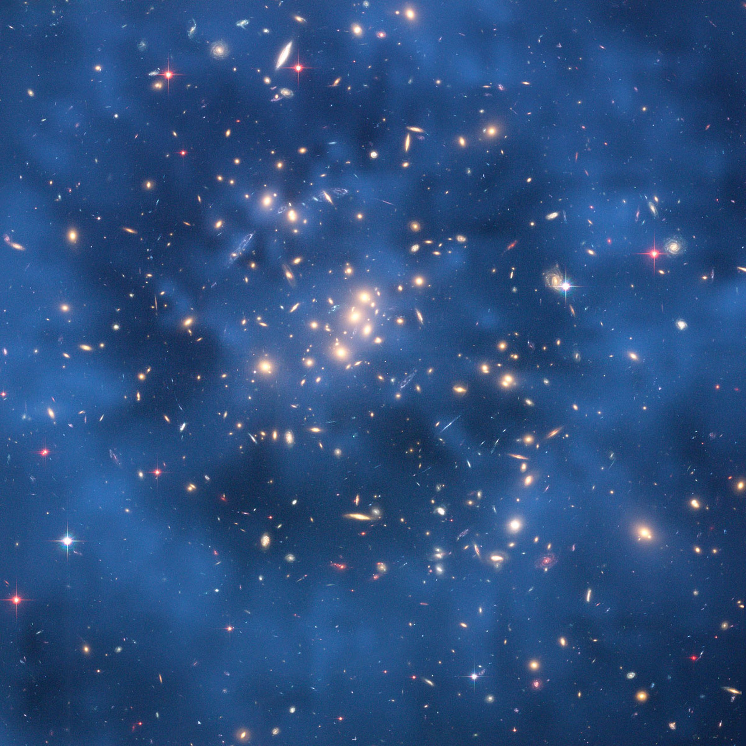 An image from NASA’s Hubble Space telescope, that indicates a ring of dark matter surrounding a galaxy cluster.