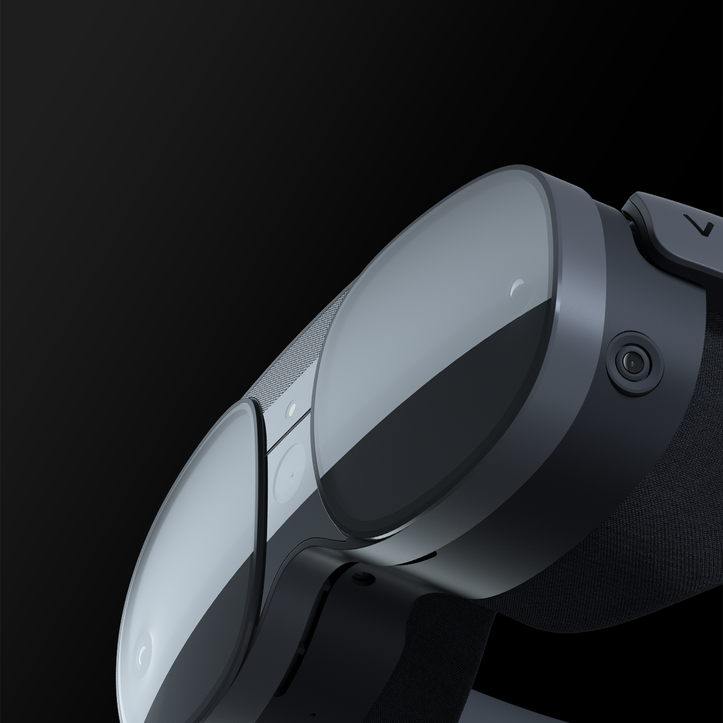 A partial view of a black VR headset design with outward-facing cameras.
