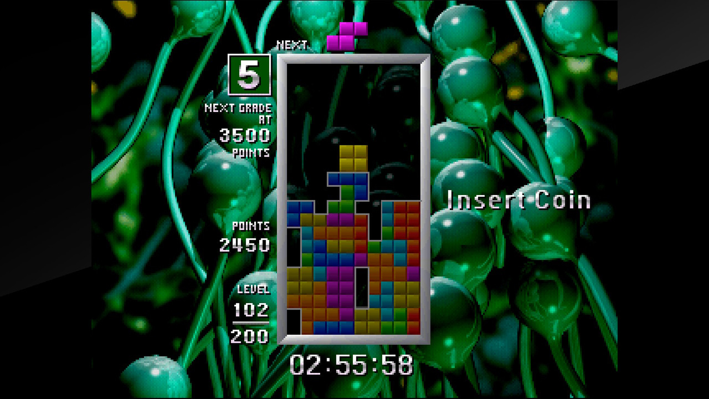 A screenshot of the video game Tetris the Grand Master.