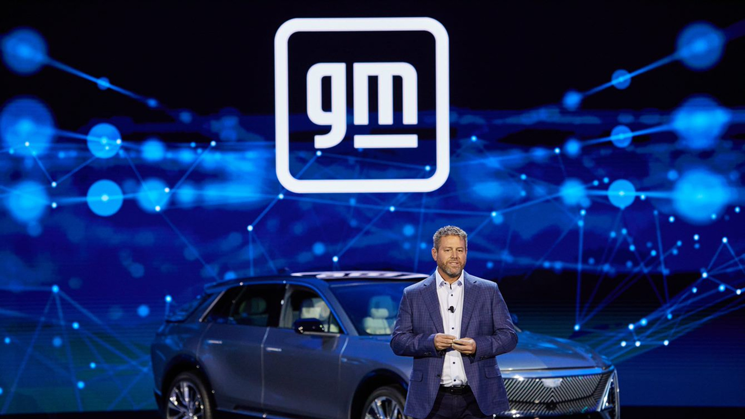 GM’s Scott Miller said customers can be won over with a better OS. 