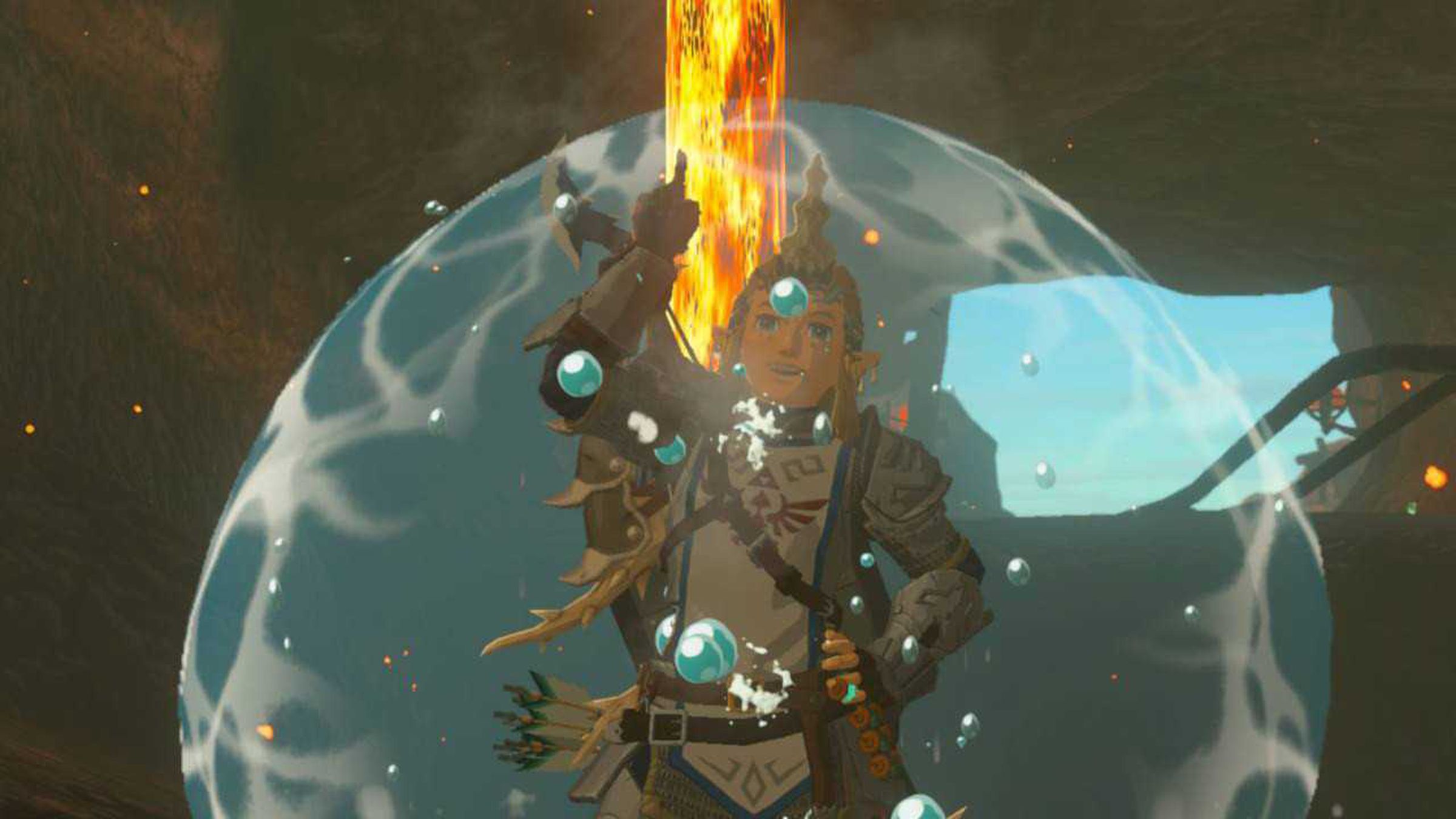Screenshot from The Legend of Zelda: Tears of the Kingdom featuring the hero Link encased in a protective water bubble in a superheated underground lava cave.
