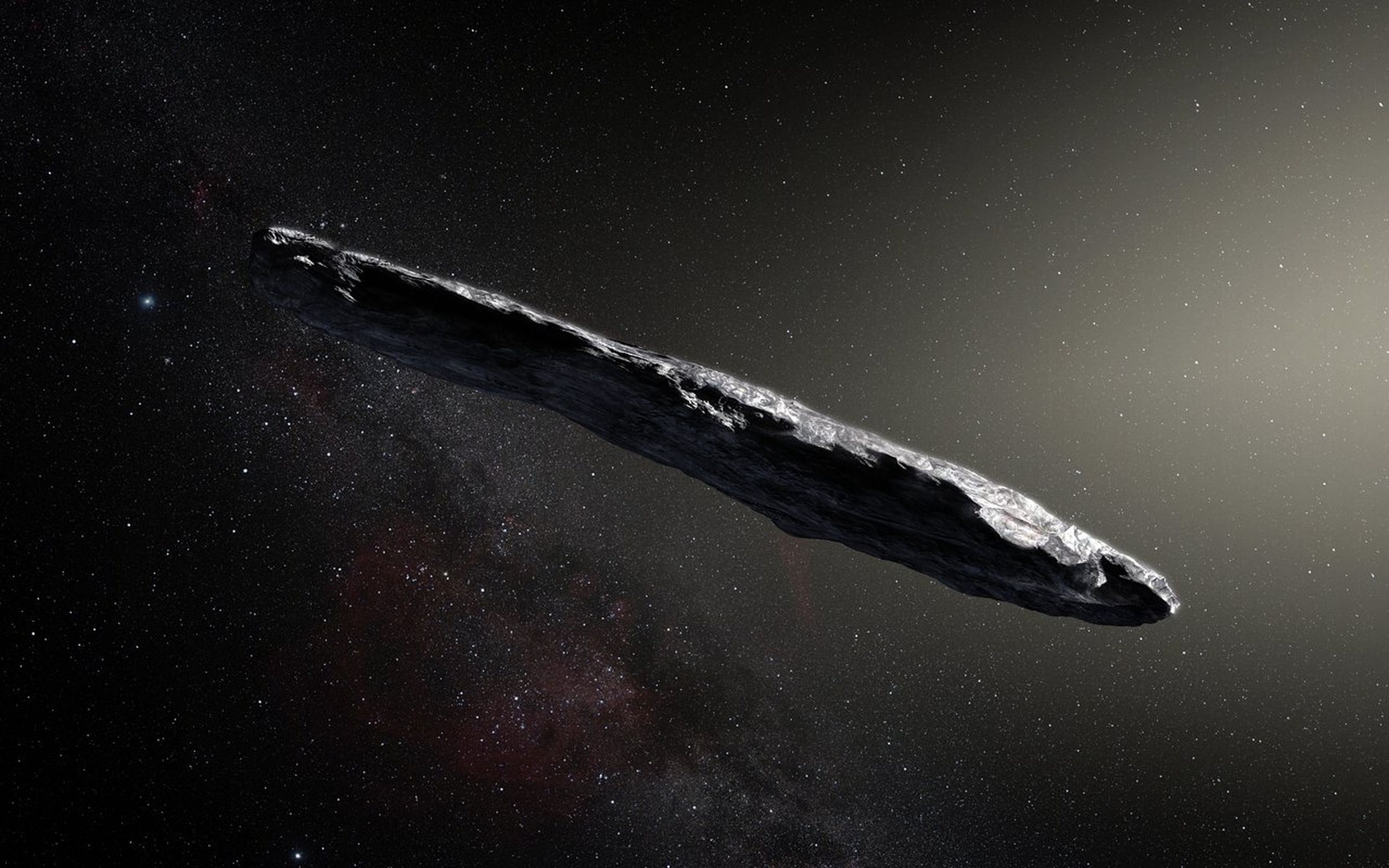 An artistic rendering of `Oumuamua, the first interstellar rock discovered.