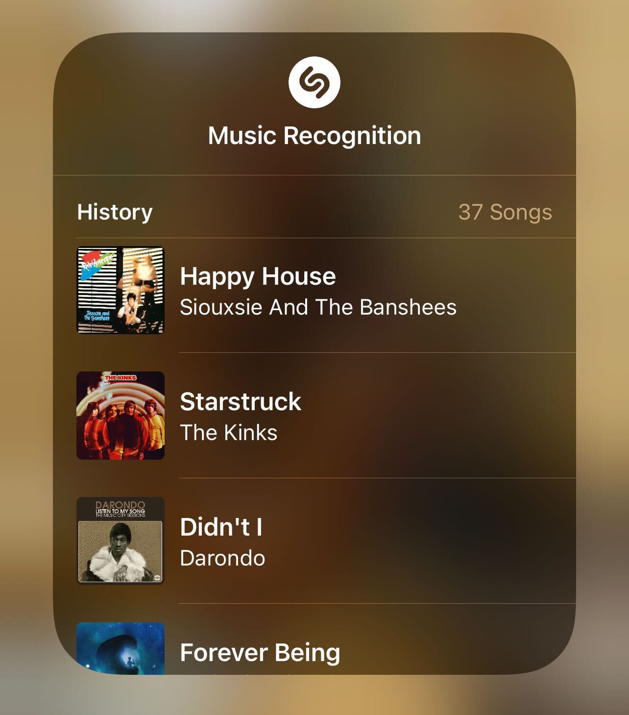 You can press and hold the Music Recognition button in the Control Center to view your Shazam’d songs on your device.