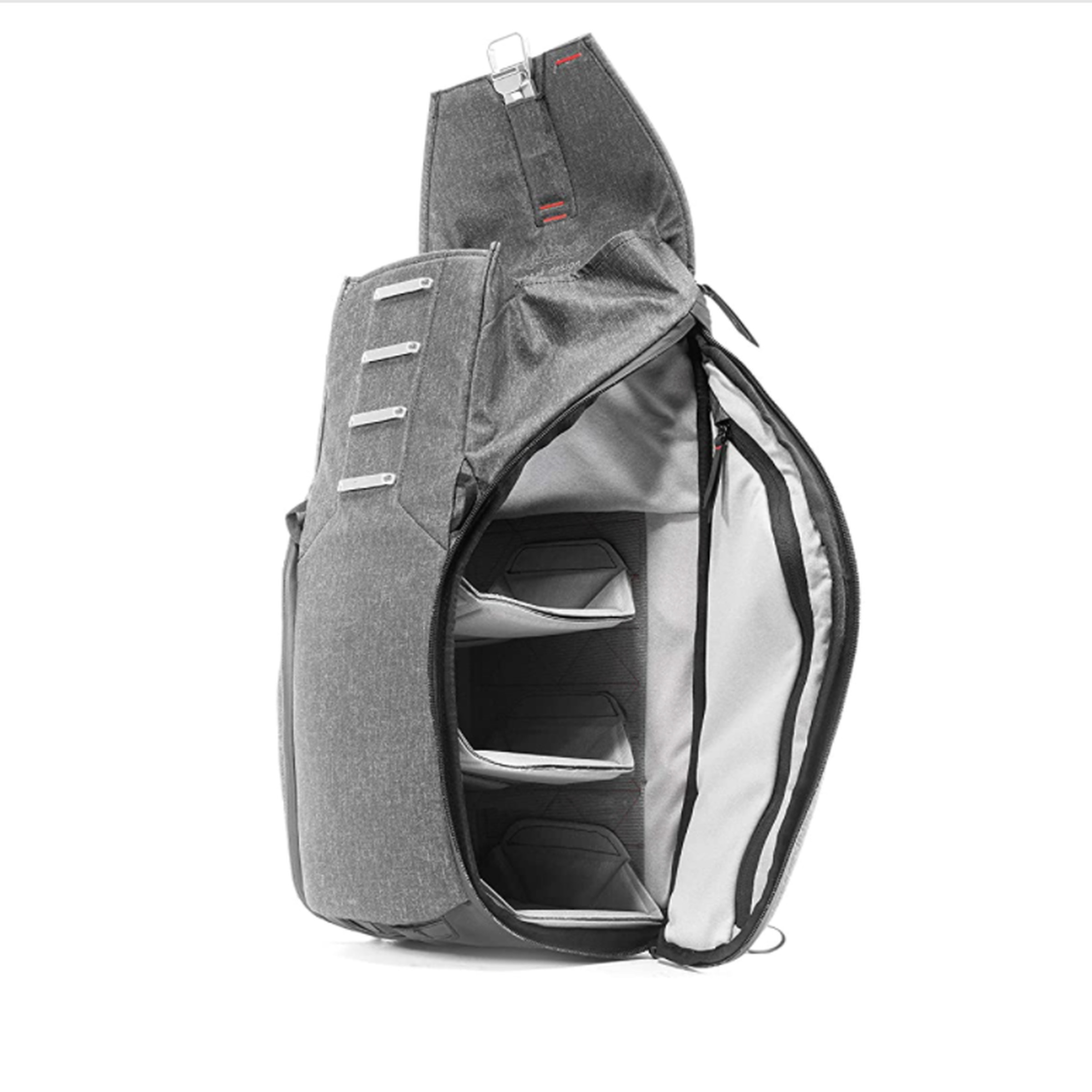 Gray backpack showing open side pocket.