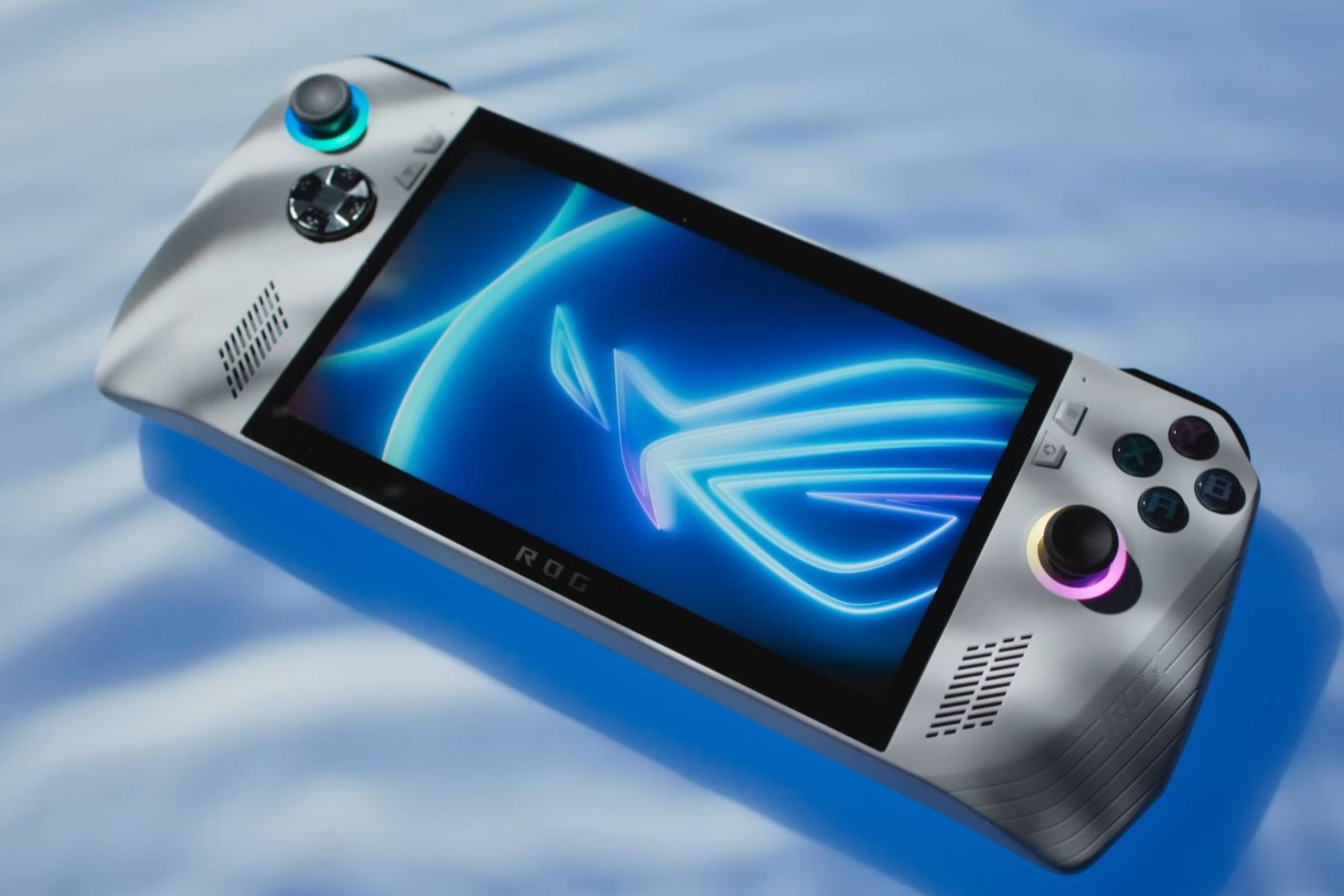 Image showing Asus ROG Ally handheld gaming PC, with a white casing and a light blue background.