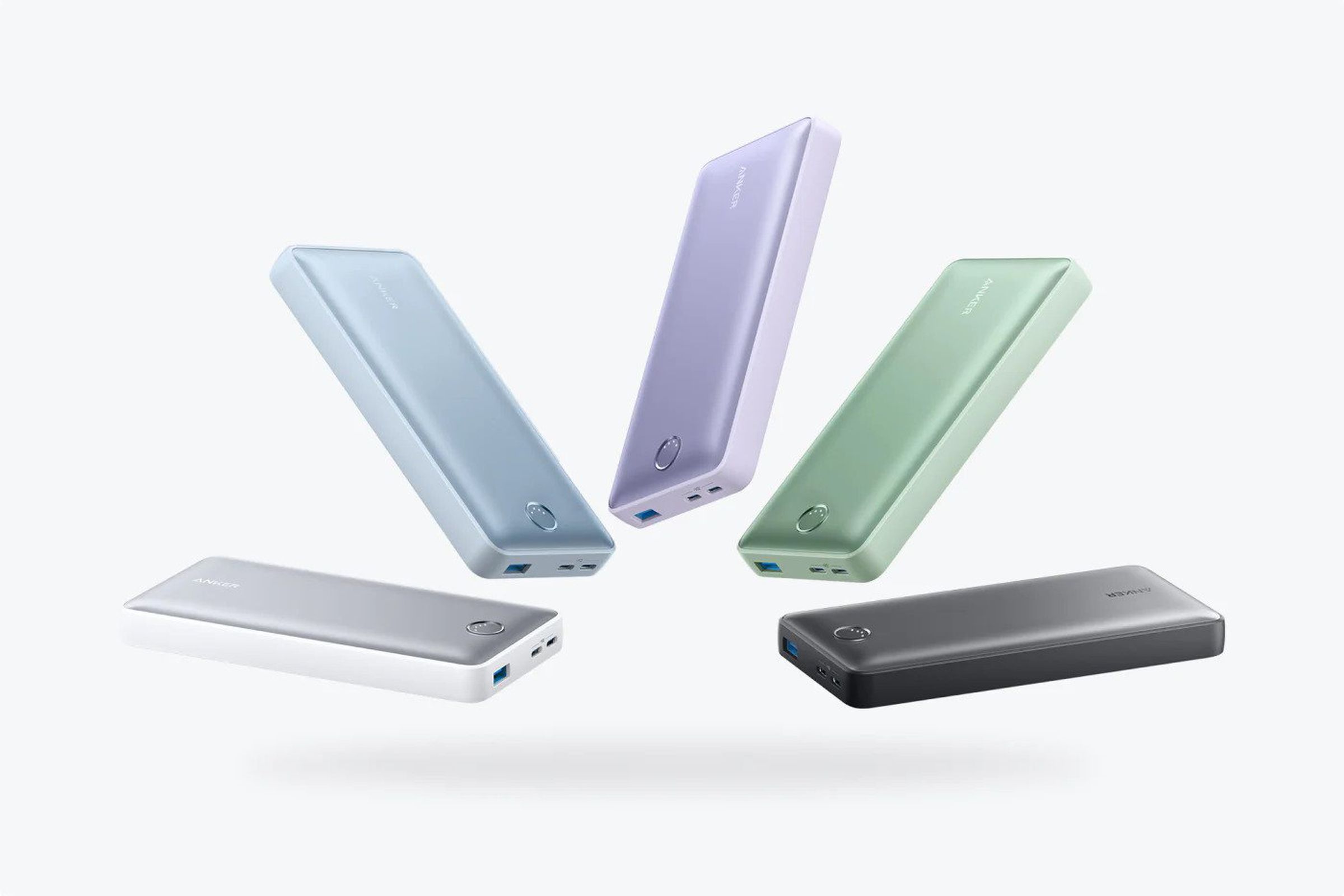 The Anker 535 Power Bank (PowerCore 20K) is a selection of colors, fanned out across a white background.