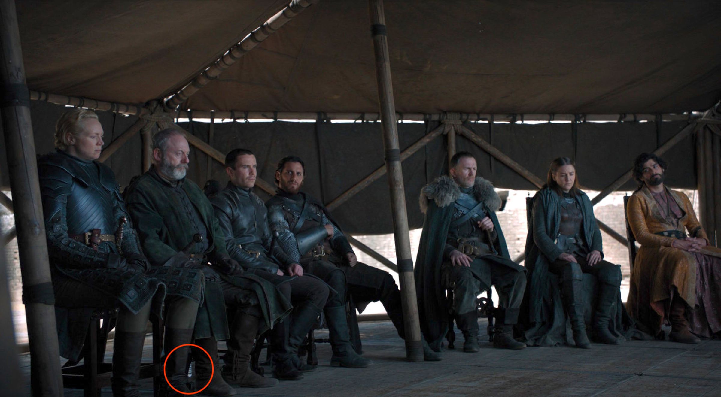 Another water bottle is behind Ser Davos’ chair.