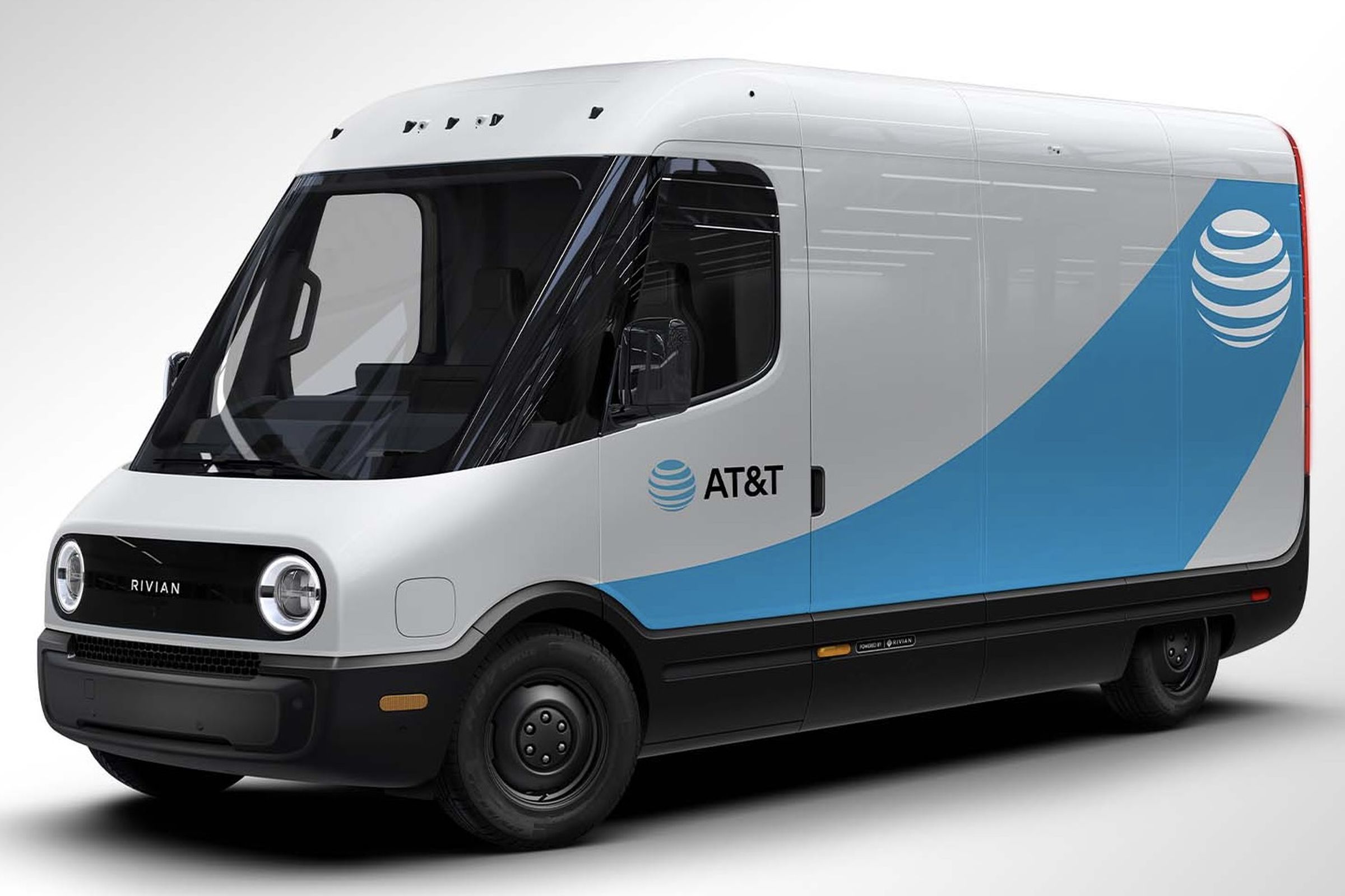 Rivian commercial van with AT&amp;T logo on side