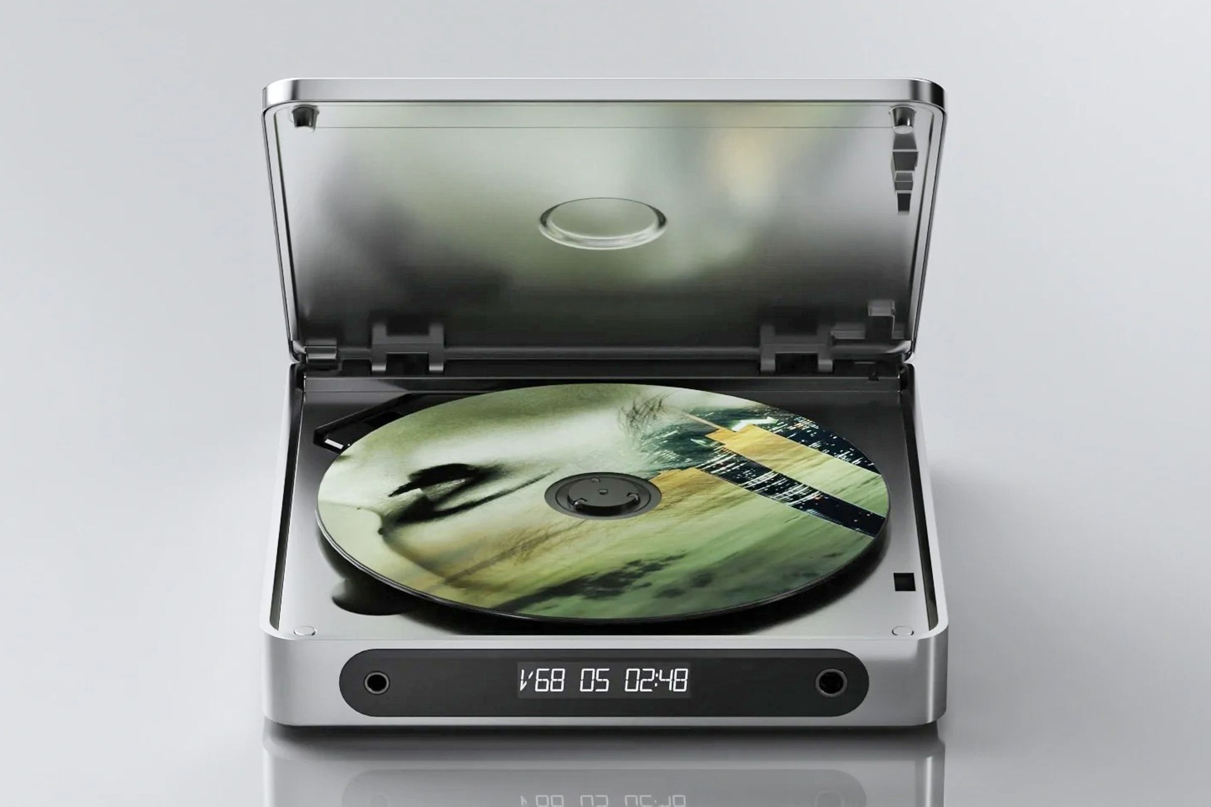 Портативний програвач компакт-дисків Fiio DM13 із відкритою кришкою та компакт-диском усередині.
