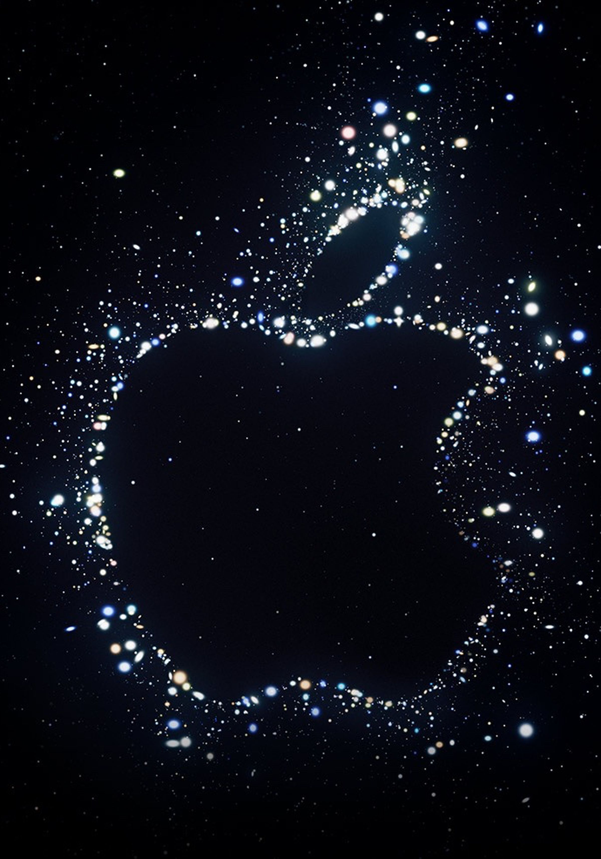 The outline of the Apple logo dotted in lights.